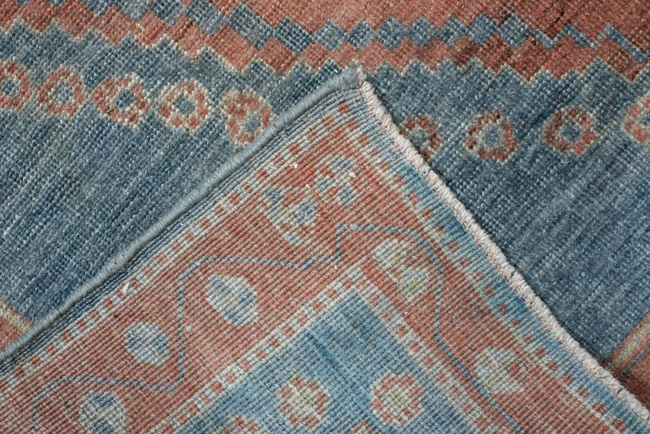 5' x 6' one-of-a-kind handmade antique Gabbe rug. Color palette: blue, terra cotta, ivory, sage, slate, terracotta, brown
