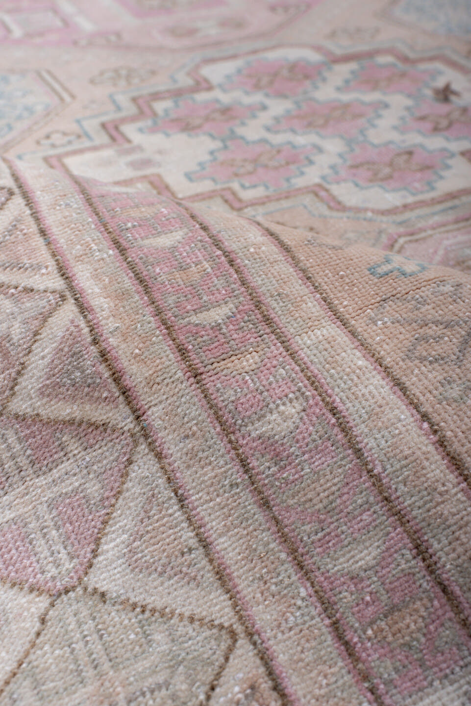 4' x 5' one-of-a-kind handmade antique Sivas small size rug. Color palette: blush, ivory, pale blue, taupe, cream, rose