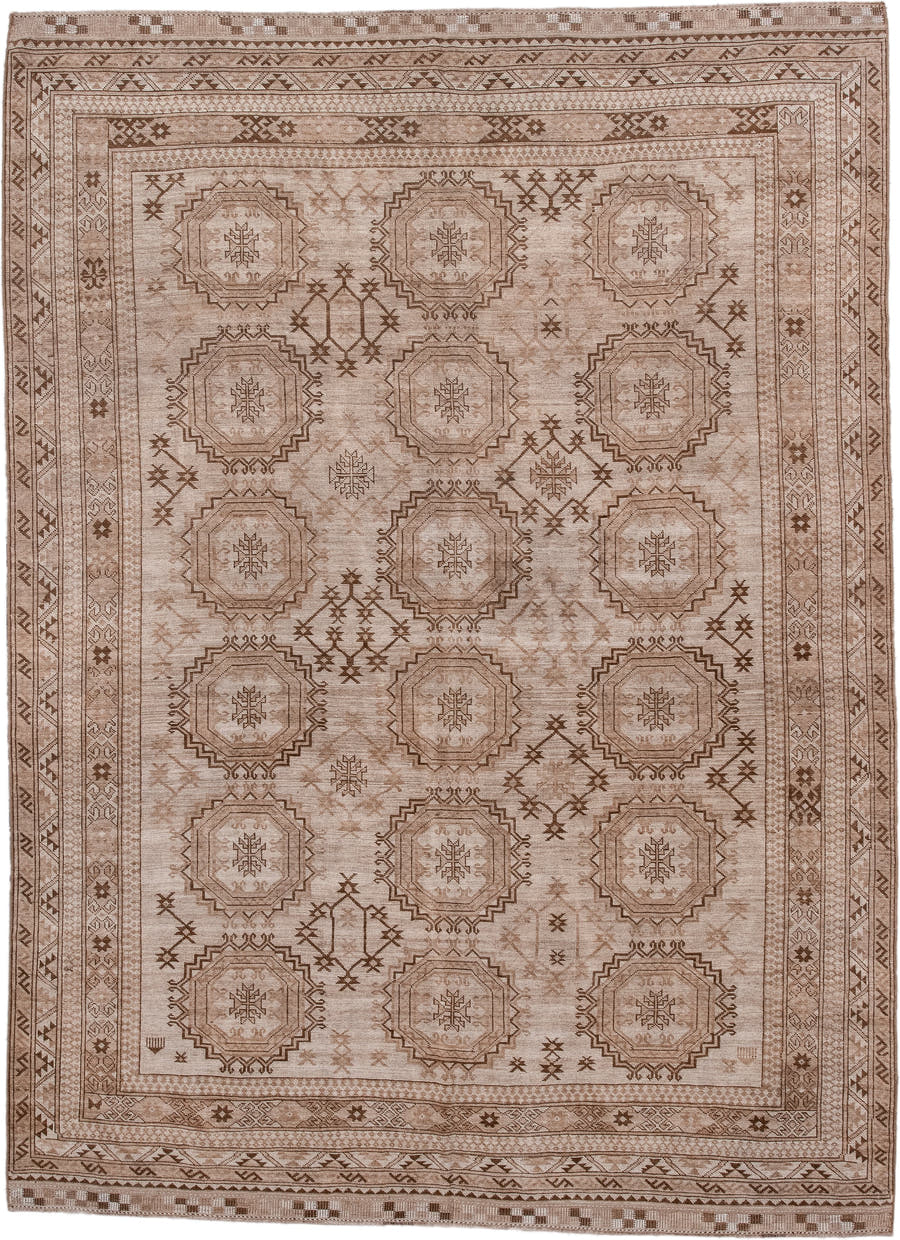 7' x 10' one-of-a-kind handmade antique Afghan large size rug. Color palette: taupe, camel, ivory, brown, beige, gray
