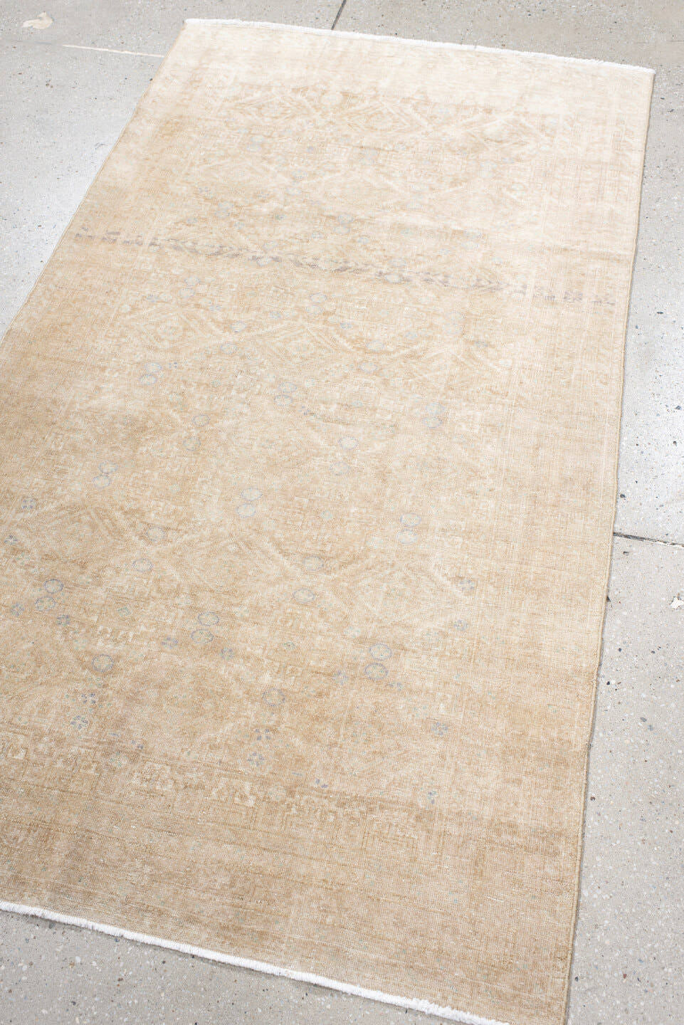 3' x 5' one-of-a-kind handmade antique Belouch small size rug. Color palette: ivory, sand, beige, pale blue, taupe, camel