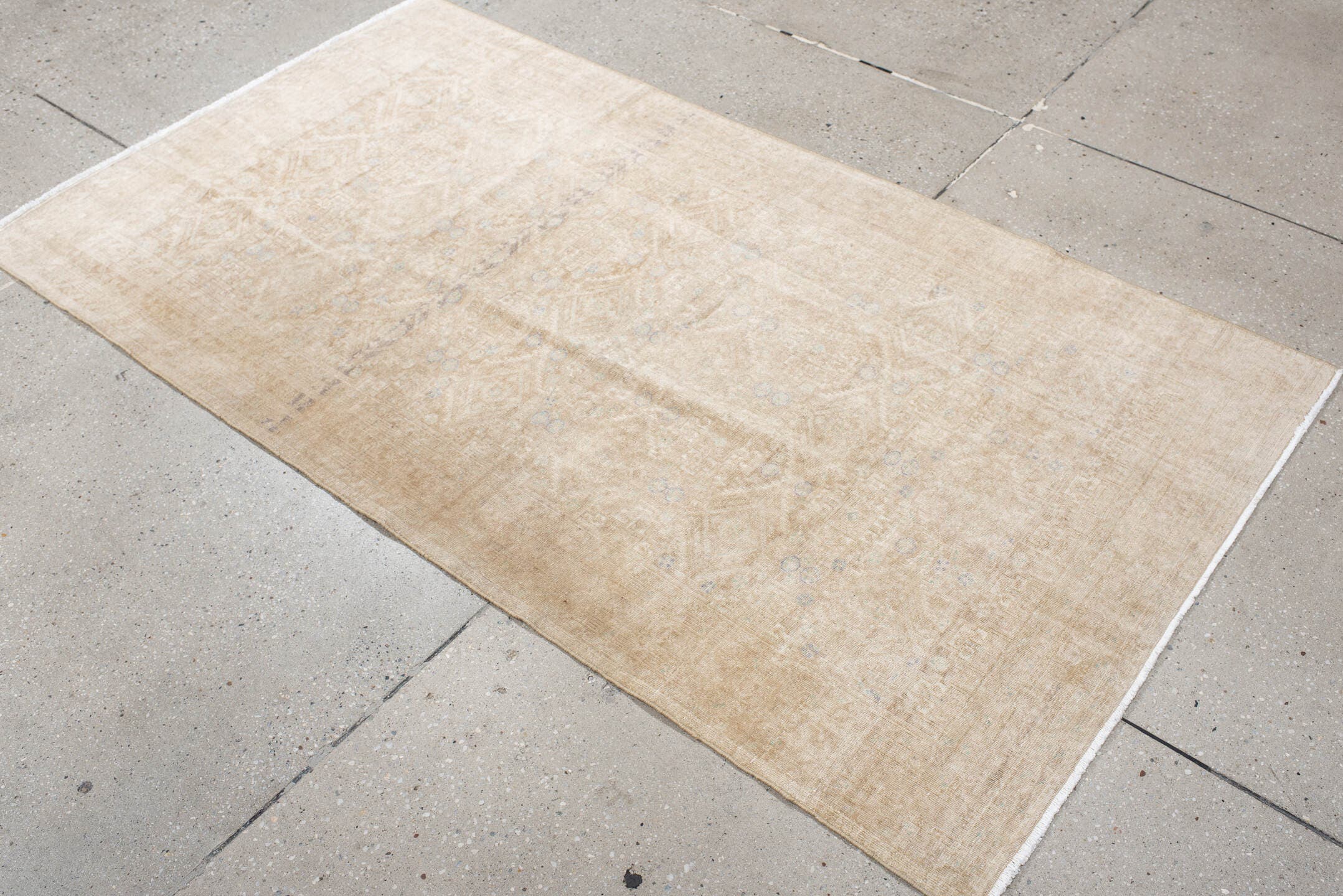 3' x 5' one-of-a-kind handmade antique Belouch small size rug. Color palette: ivory, sand, beige, pale blue, taupe, camel