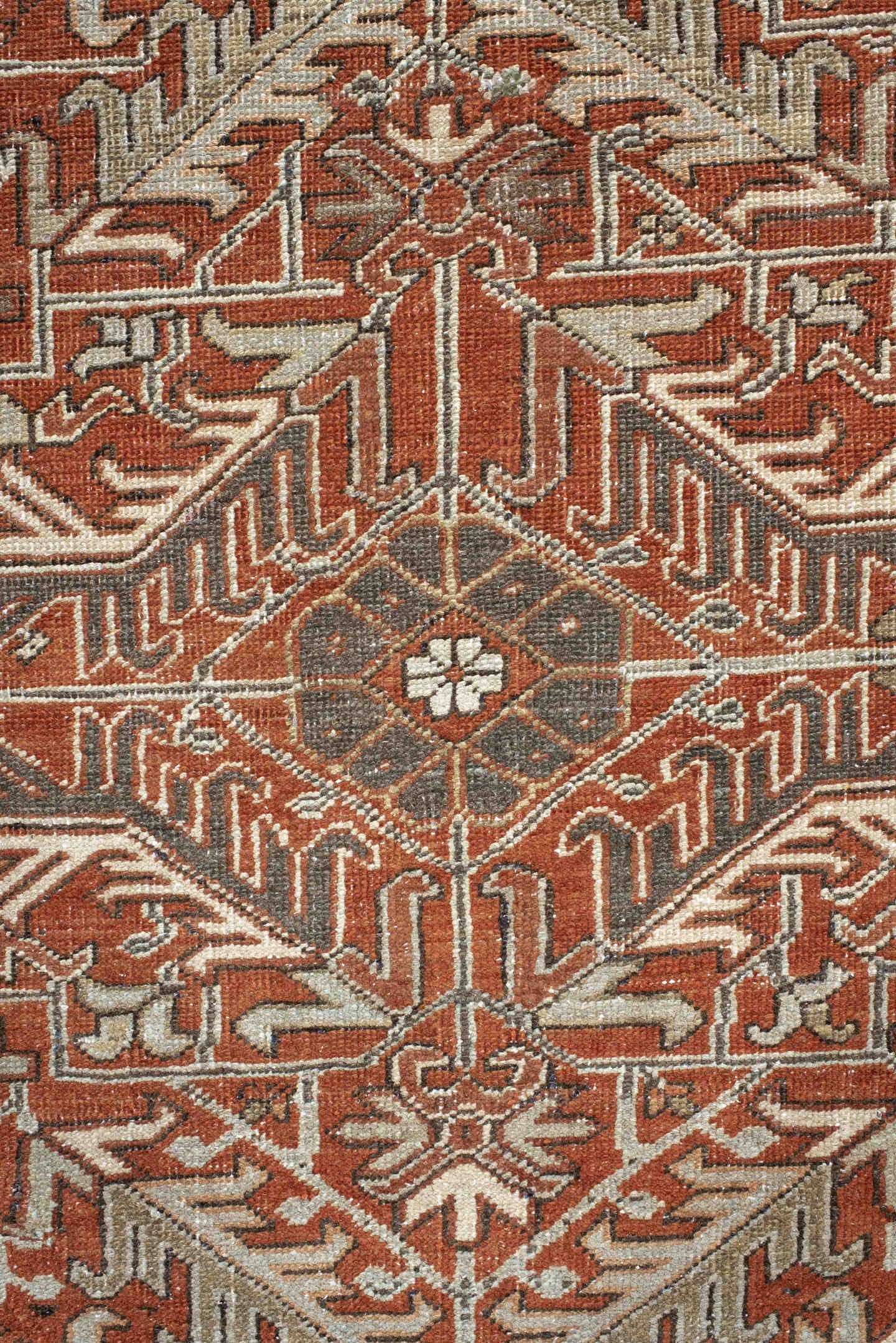 8' x 9' one-of-a-kind handmade antique Heriz rug. Color palette: terra cotta, ivory, taupe, brown, charcoal, rust