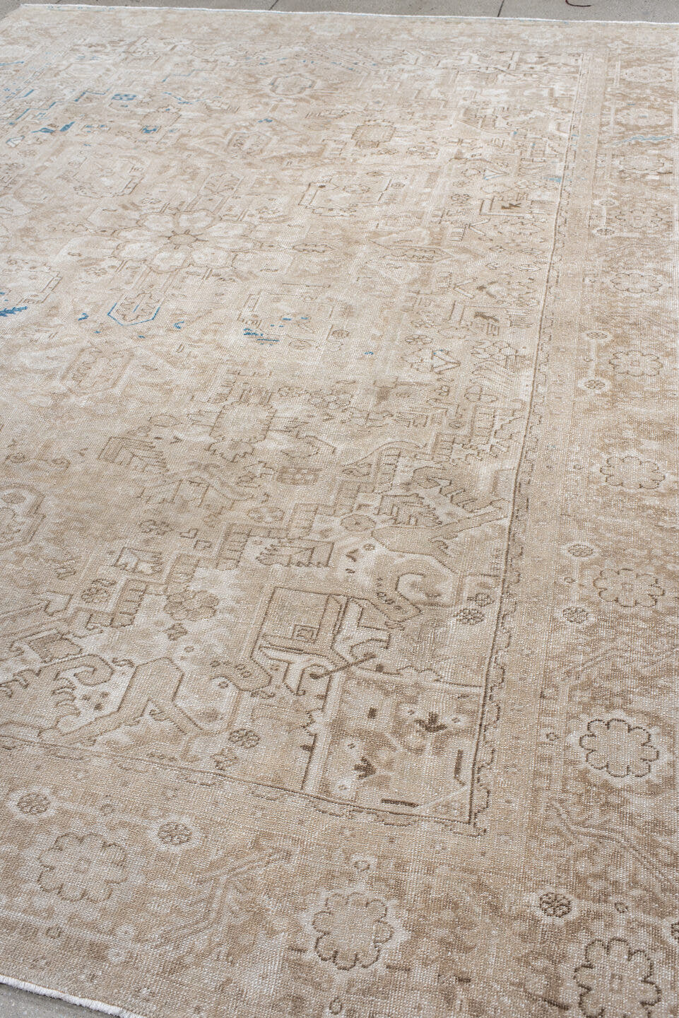 9' x 12' one-of-a-kind handmade antique Heriz large size rug. Color palette: ivory, beige, taupe, sky blue, camel, gray