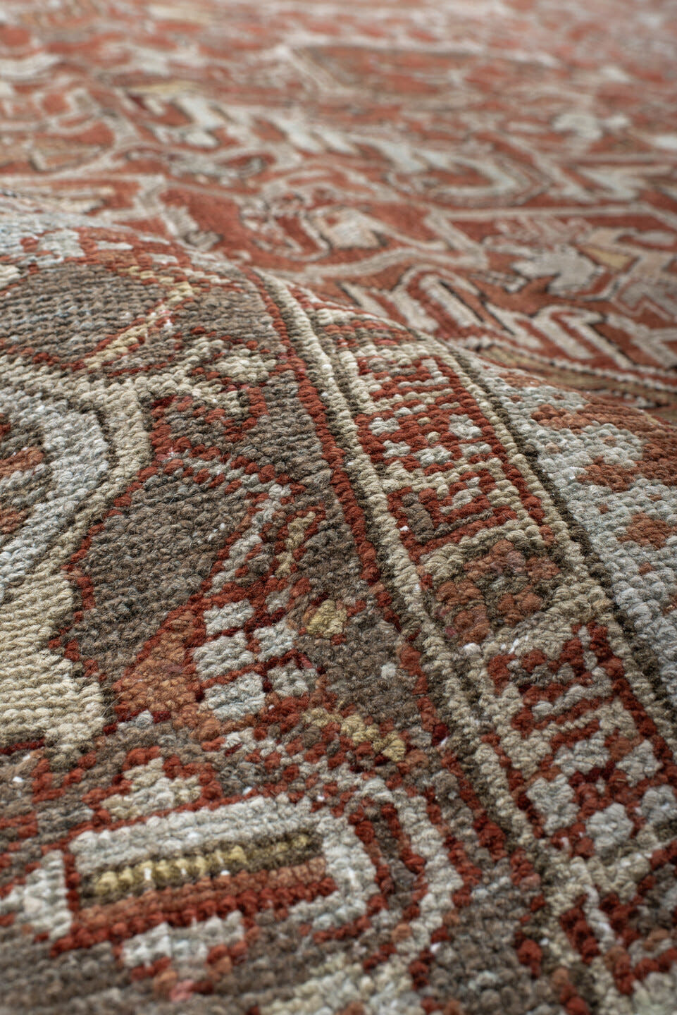 8' x 10' one-of-a-kind handmade antique large size rug. Color palette: terra cotta, ivory, pale blue, rust, taupe, brown