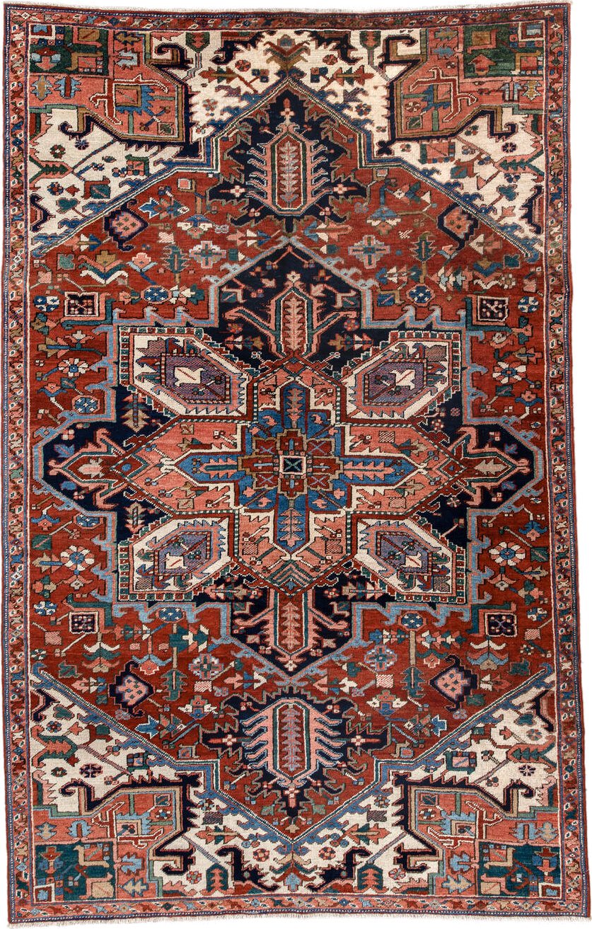 6' x 9' one-of-a-kind handmade vintage Heriz medium size rug. Color palette: rust, ivory, navy, sky blue, coral, teal, sage