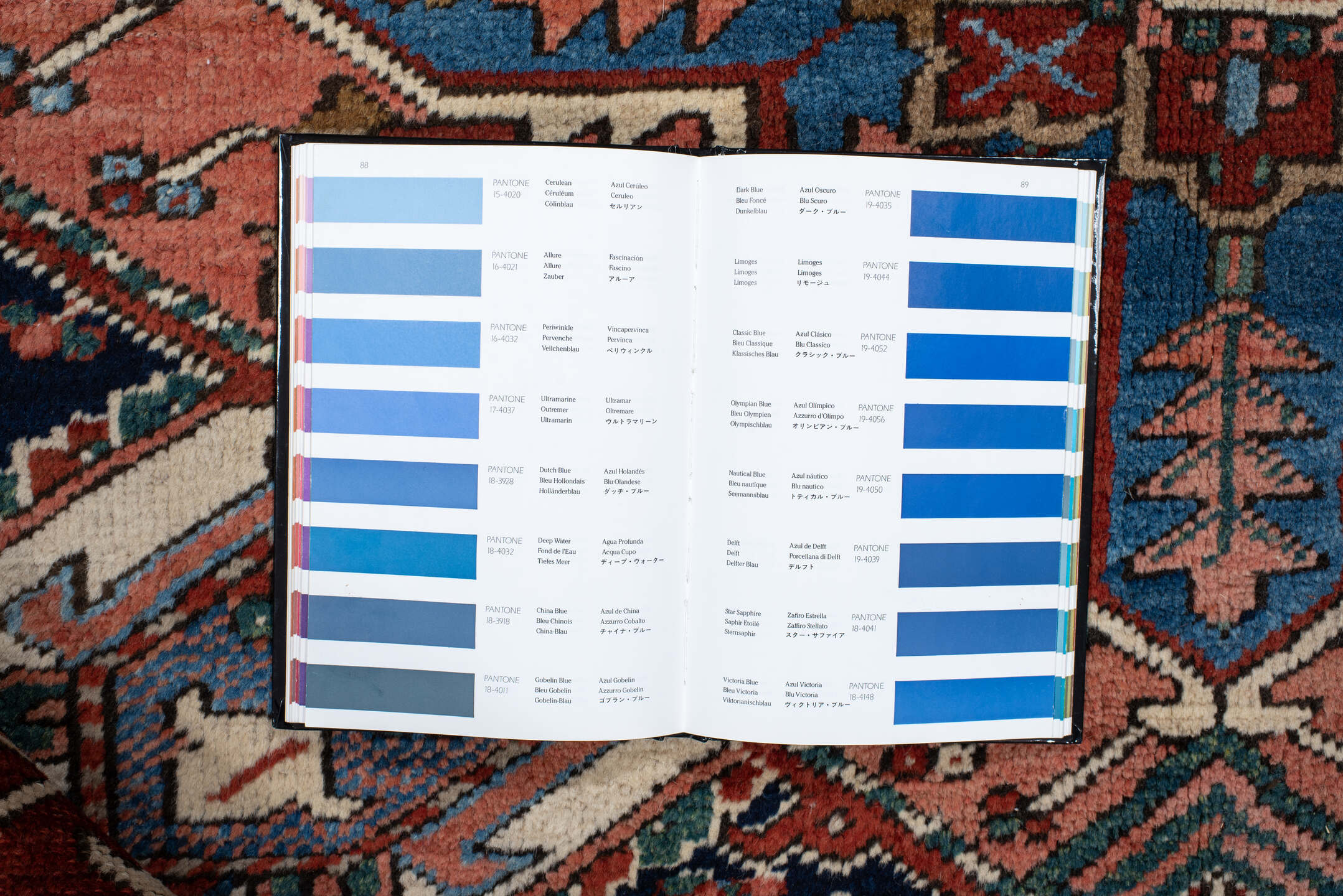 6' x 9' one-of-a-kind handmade vintage Heriz medium size rug. Color palette: rust, ivory, navy, sky blue, coral, teal, sage