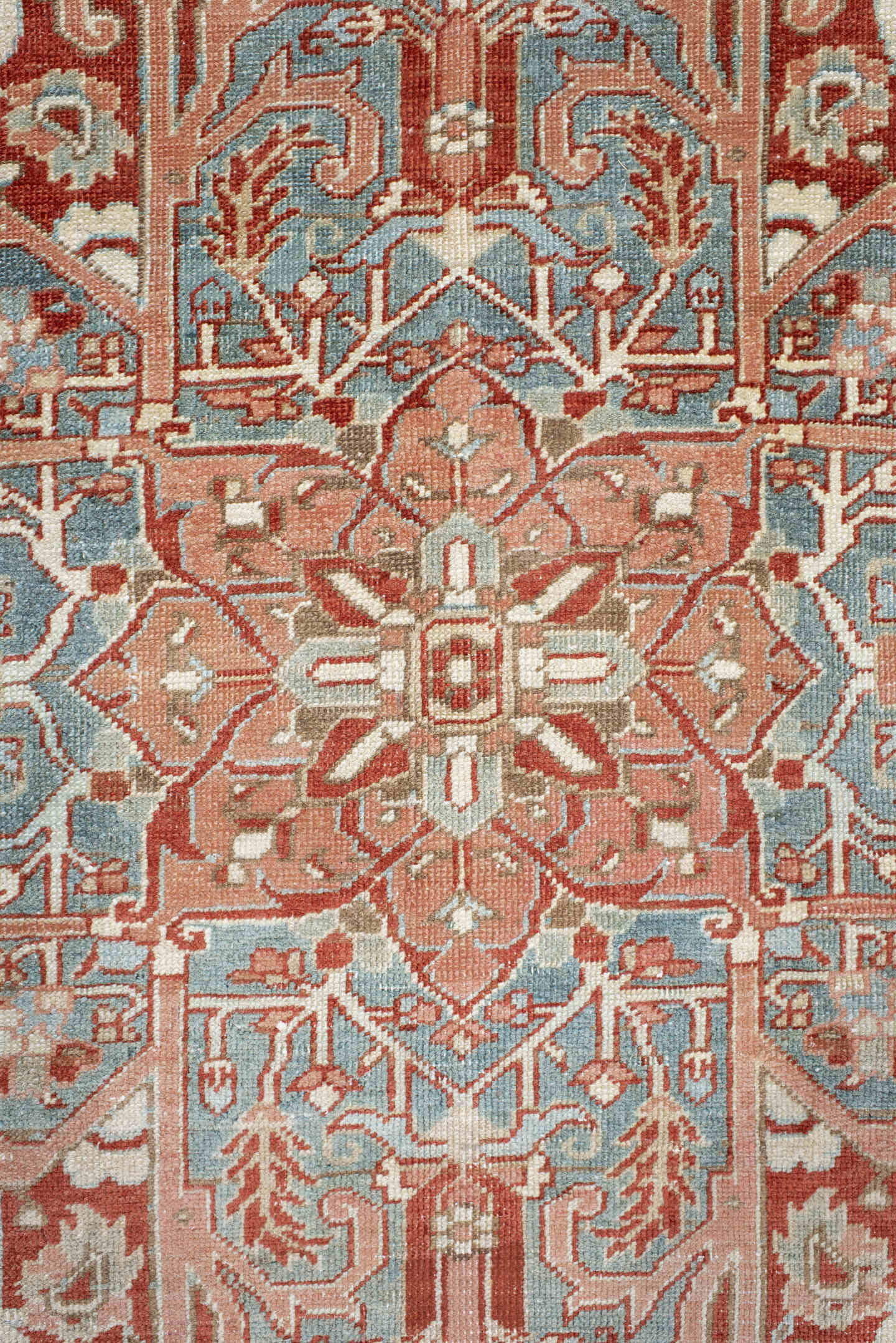 7' x 10' one-of-a-kind handmade antique Heriz large size rug. Color palette: rust, ivory, pale blue, terra cotta, sage