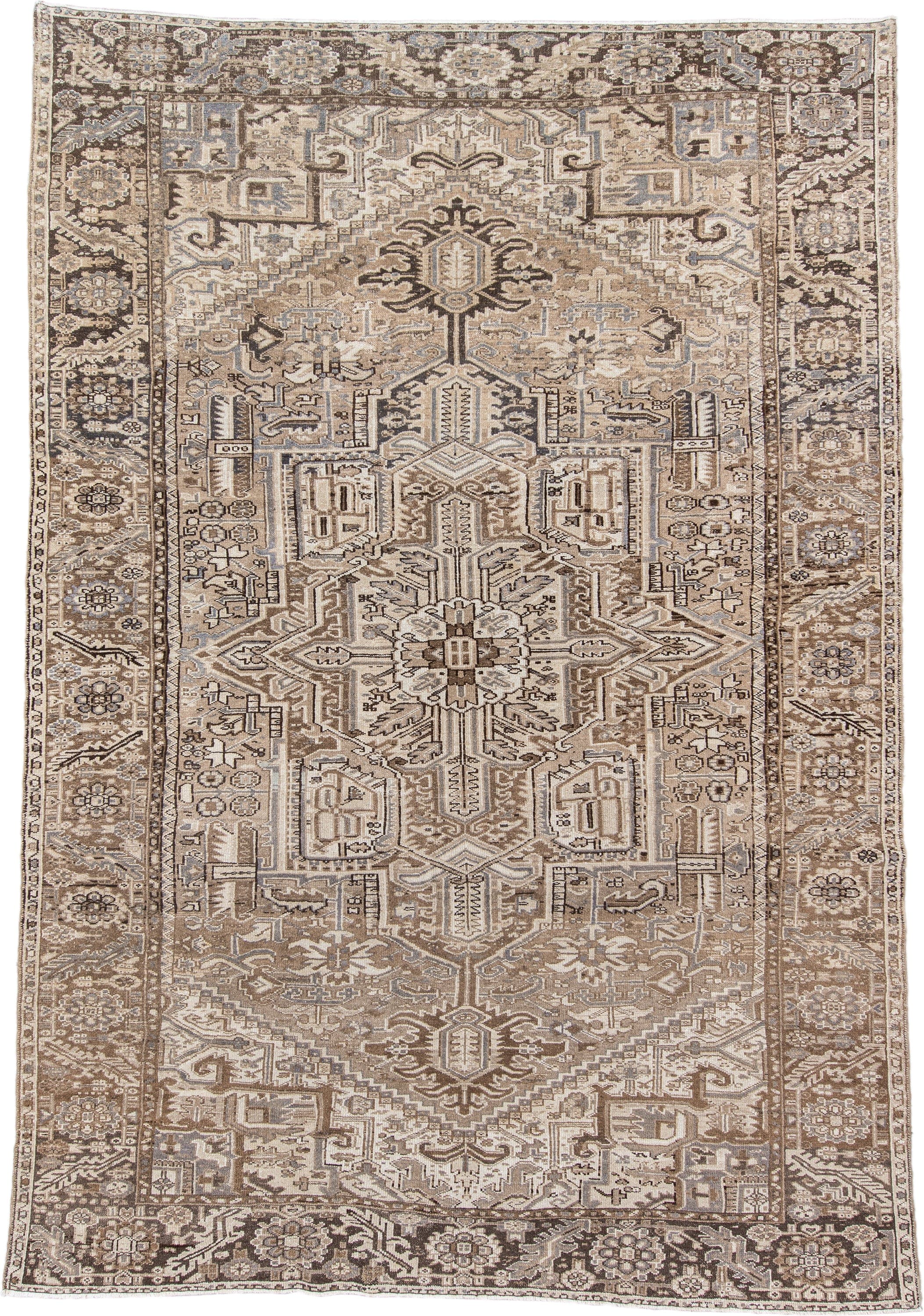 7' x 11' one-of-a-kind handmade antique Karaje large size rug. Color palette: taupe, ivory, brown, pale_blue, camel