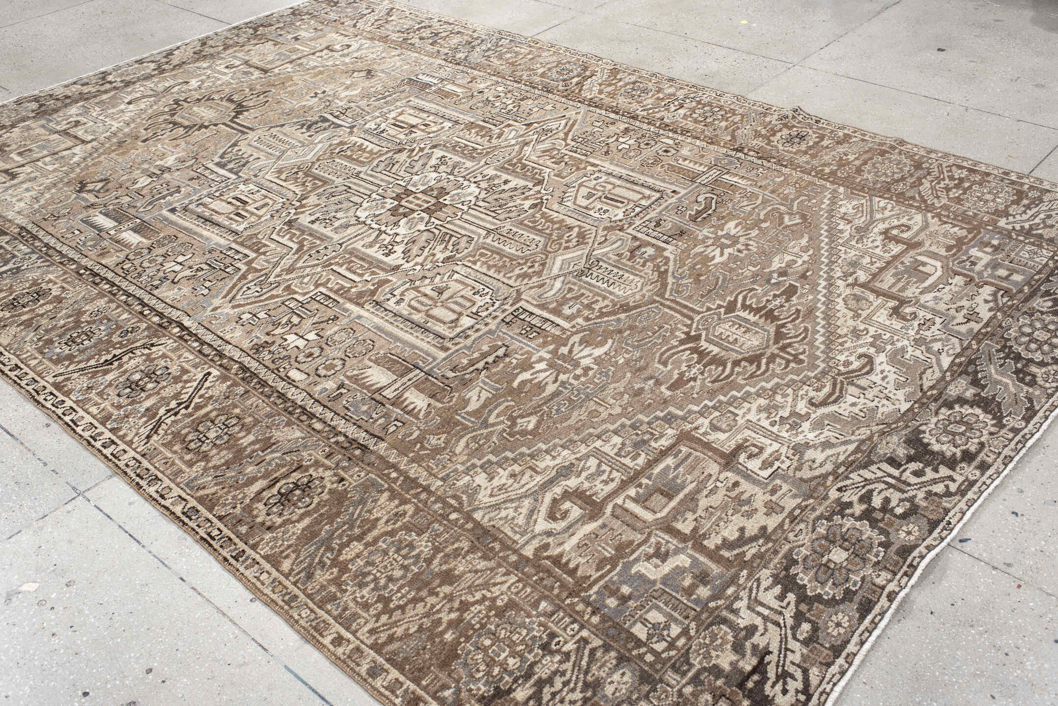 7' x 11' one-of-a-kind handmade antique Karaje large size rug. Color palette: taupe, ivory, brown, pale_blue, camel