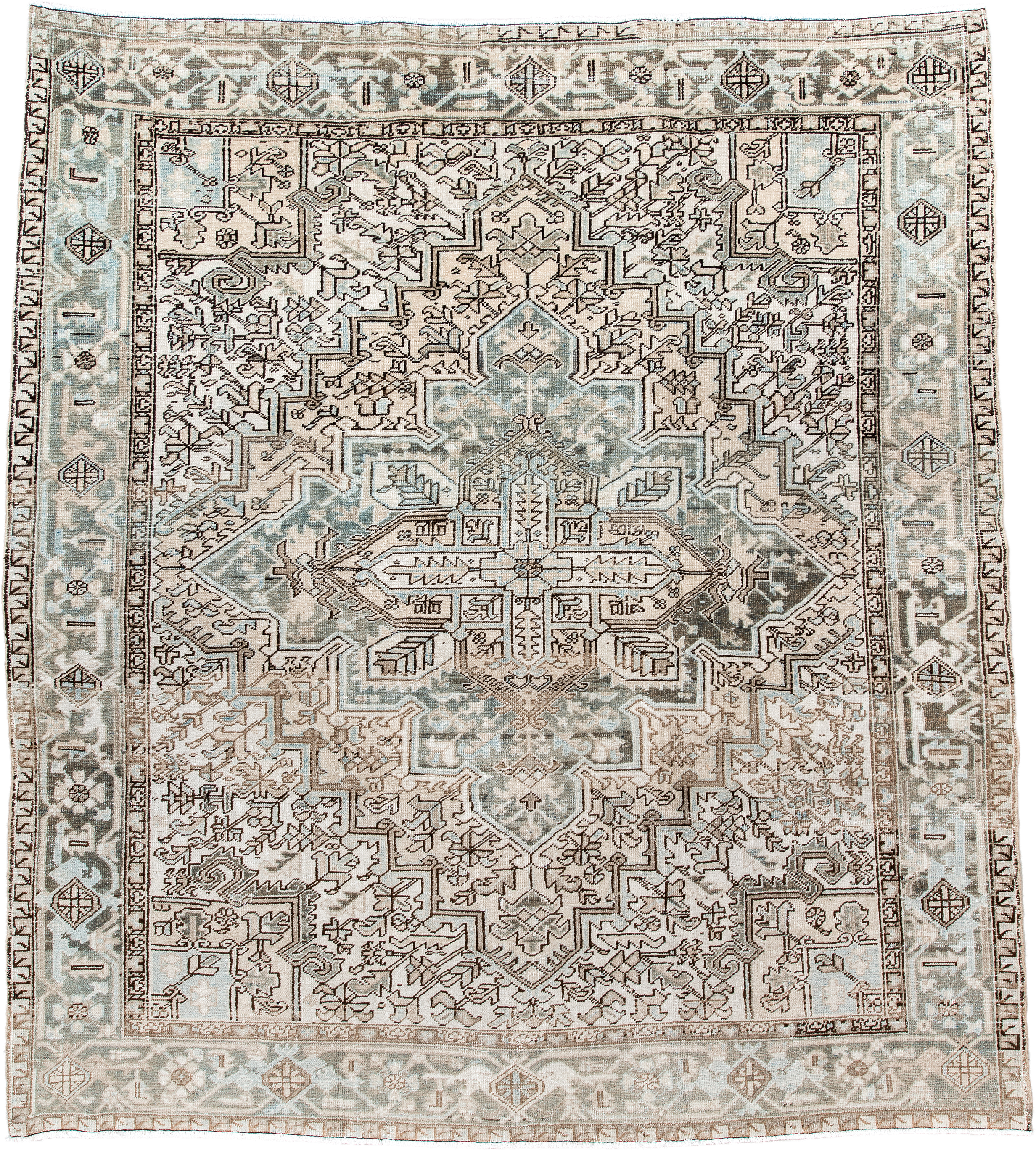 7' x 8' one-of-a-kind handmade antique Heriz rug. Color palette: ivory, pale blue, taupe, brown, beige, camel, slate