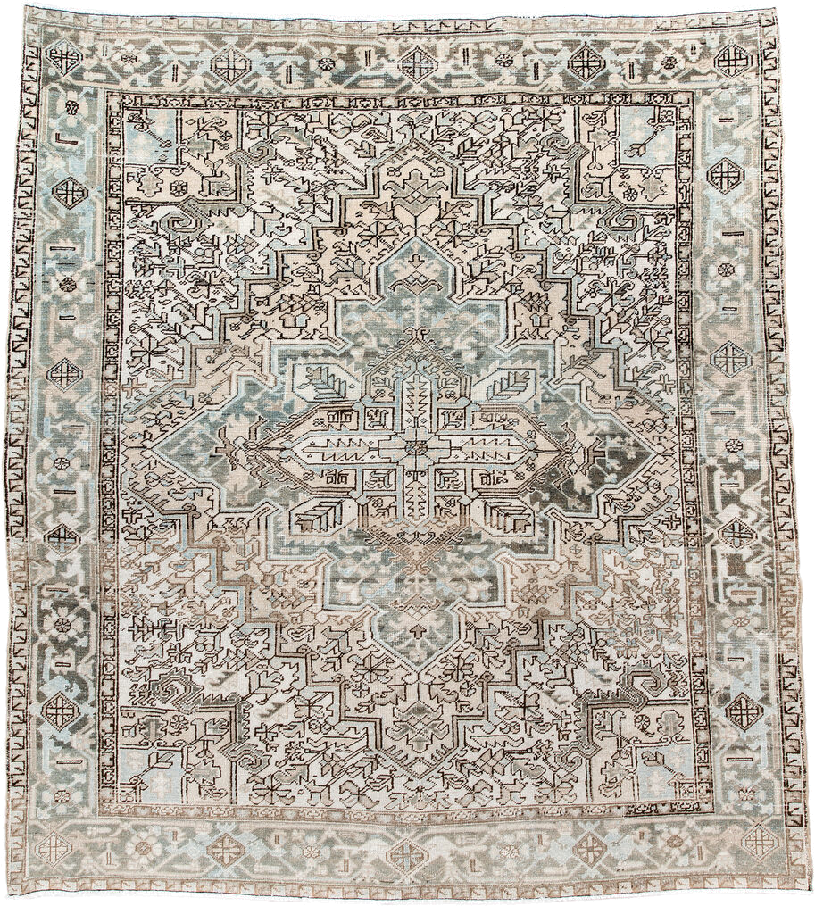 7' x 8' one-of-a-kind handmade antique Heriz rug. Color palette: ivory, pale blue, taupe, brown, beige, camel, slate