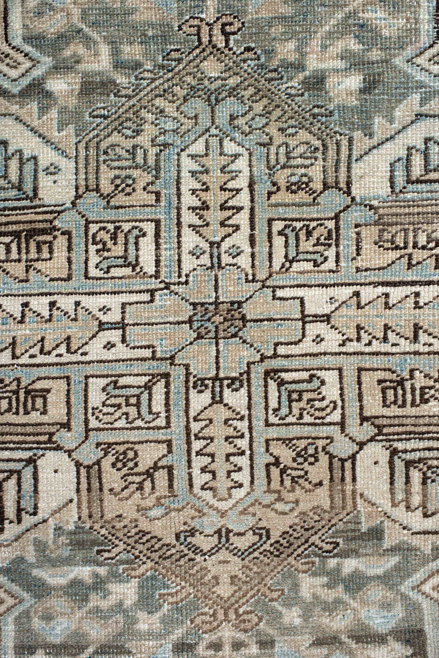 7' x 8' one-of-a-kind handmade antique Heriz rug. Color palette: ivory, pale blue, taupe, brown, beige, camel, slate