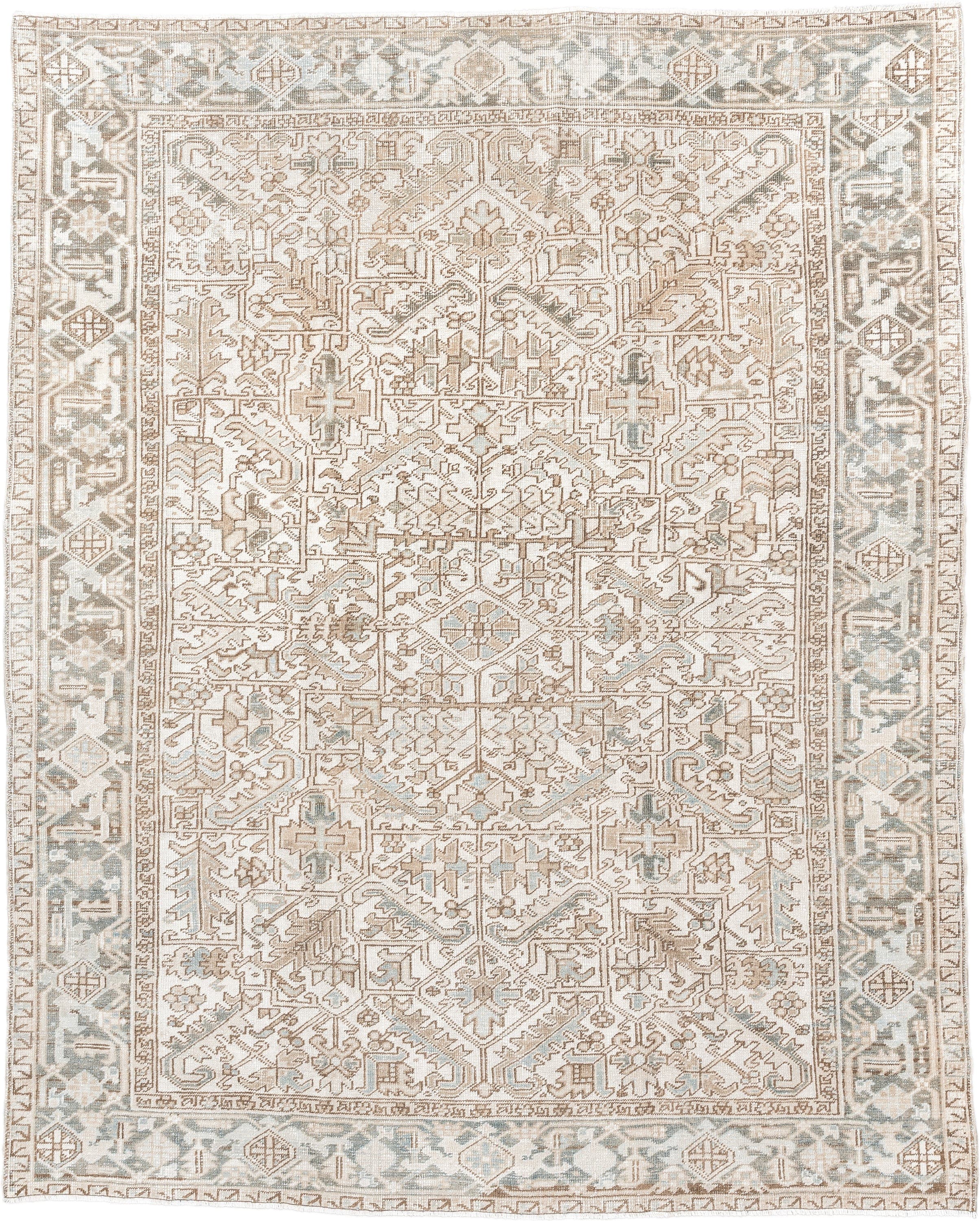 7' x 9' one-of-a-kind handmade antique Heriz rug. Color palette: ivory, camel, pale blue, taupe, beige, light gray