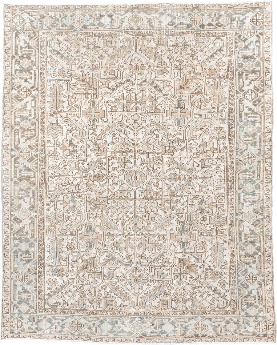 7' x 9' one-of-a-kind handmade antique Heriz rug. Color palette: ivory, camel, pale blue, taupe, beige, light gray