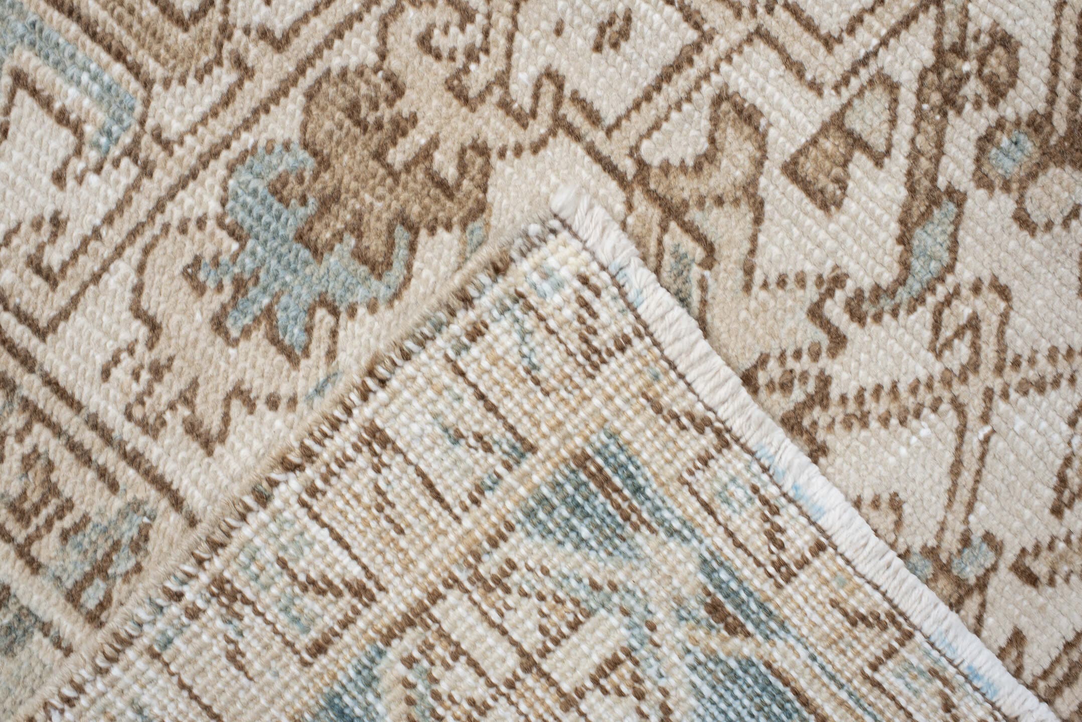 7' x 9' one-of-a-kind handmade antique Heriz rug. Color palette: ivory, camel, pale blue, taupe, beige, light gray