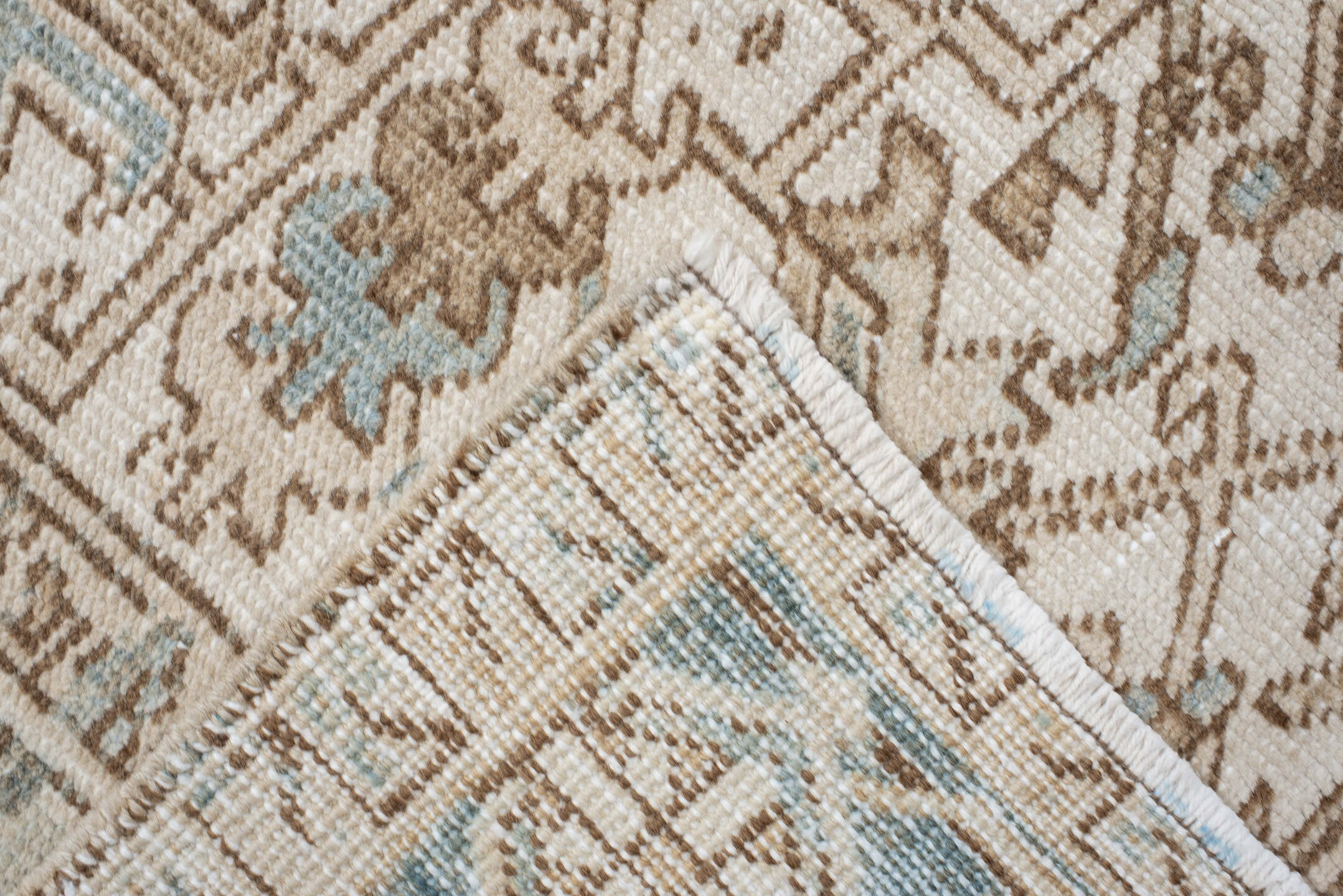 7' x 9' one-of-a-kind handmade antique Heriz rug. Color palette: ivory, camel, pale blue, taupe, beige, light gray