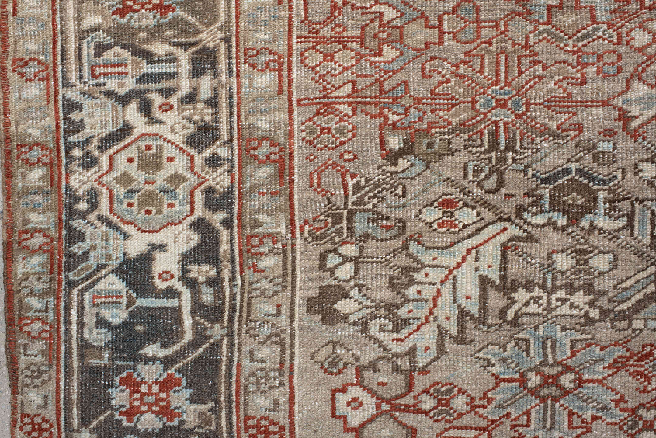 7' x 8' one-of-a-kind handmade vintage Heriz rug. Color palette: black, brown, gray, light gray, off-white, pink, red
