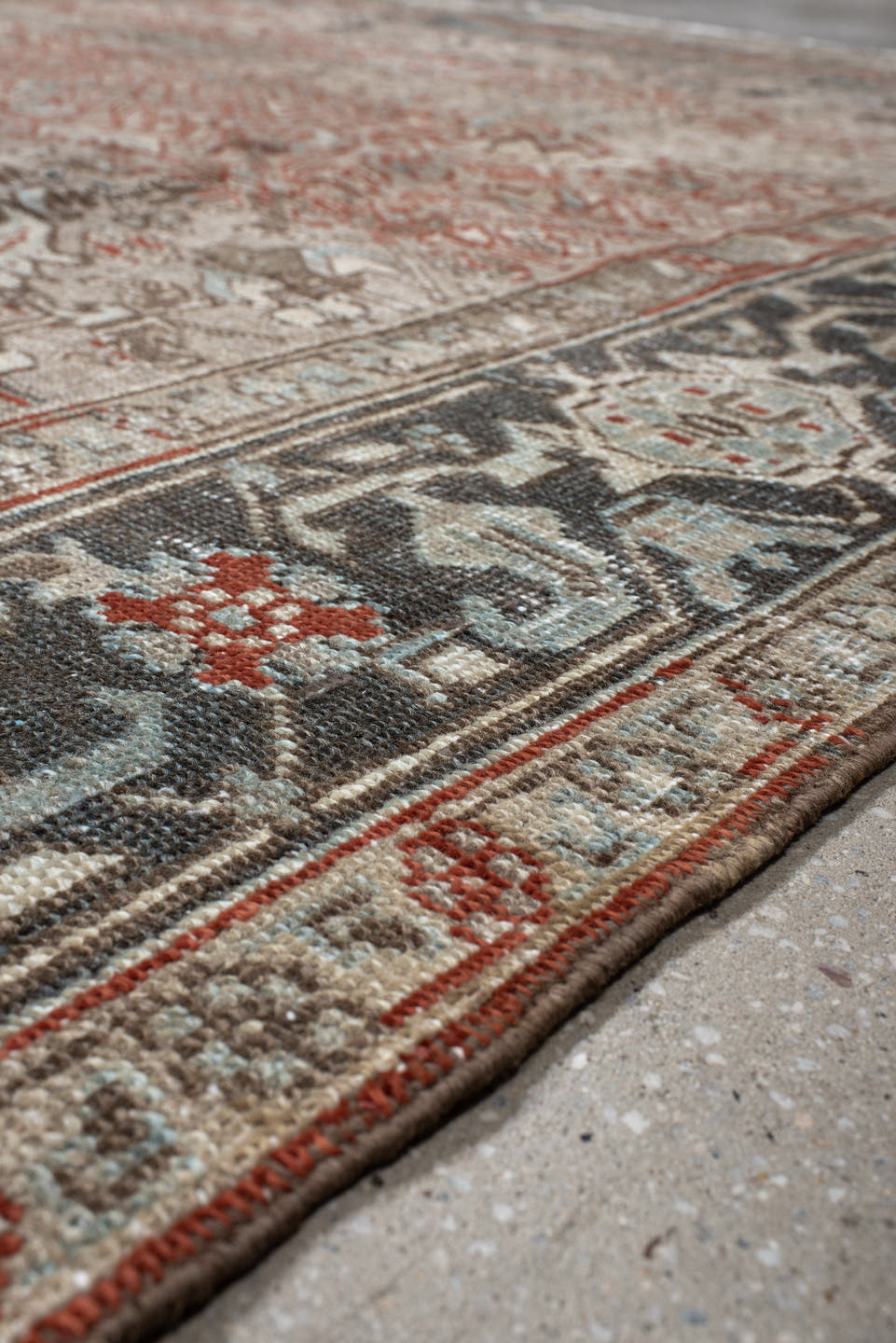 7' x 8' one-of-a-kind handmade antique Heriz rug. Color palette: ivory, taupe, charcoal, slate, rust, cream, blue_gray
