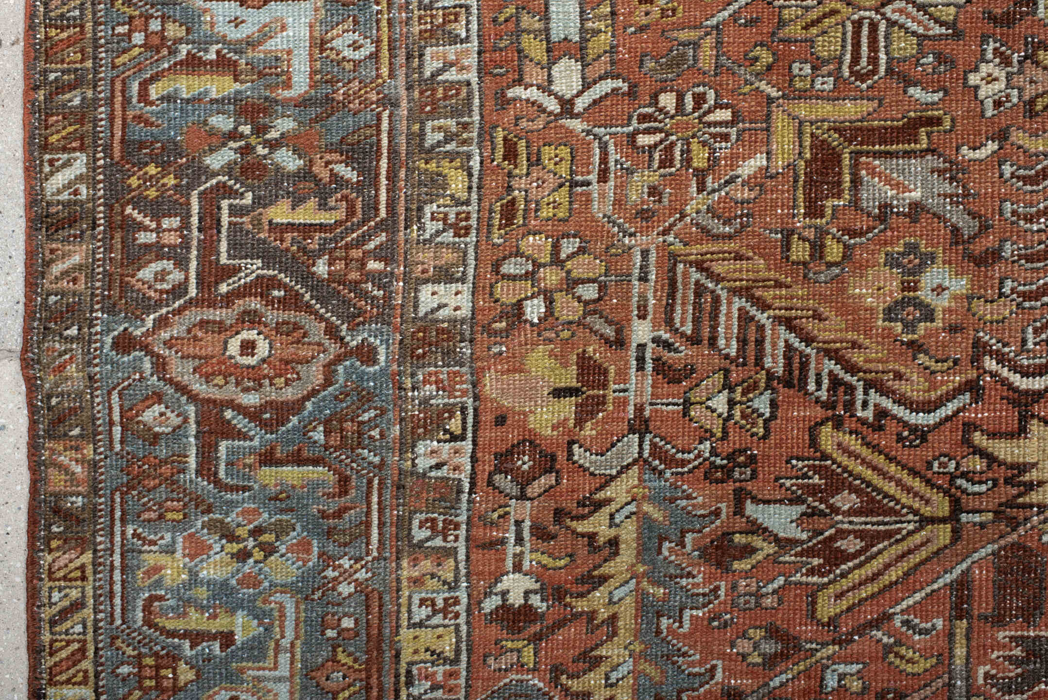 6' x 7' one-of-a-kind handmade vintage Heriz rug. Color palette: terra cotta, slate blue, ivory, charcoal, rust, camel