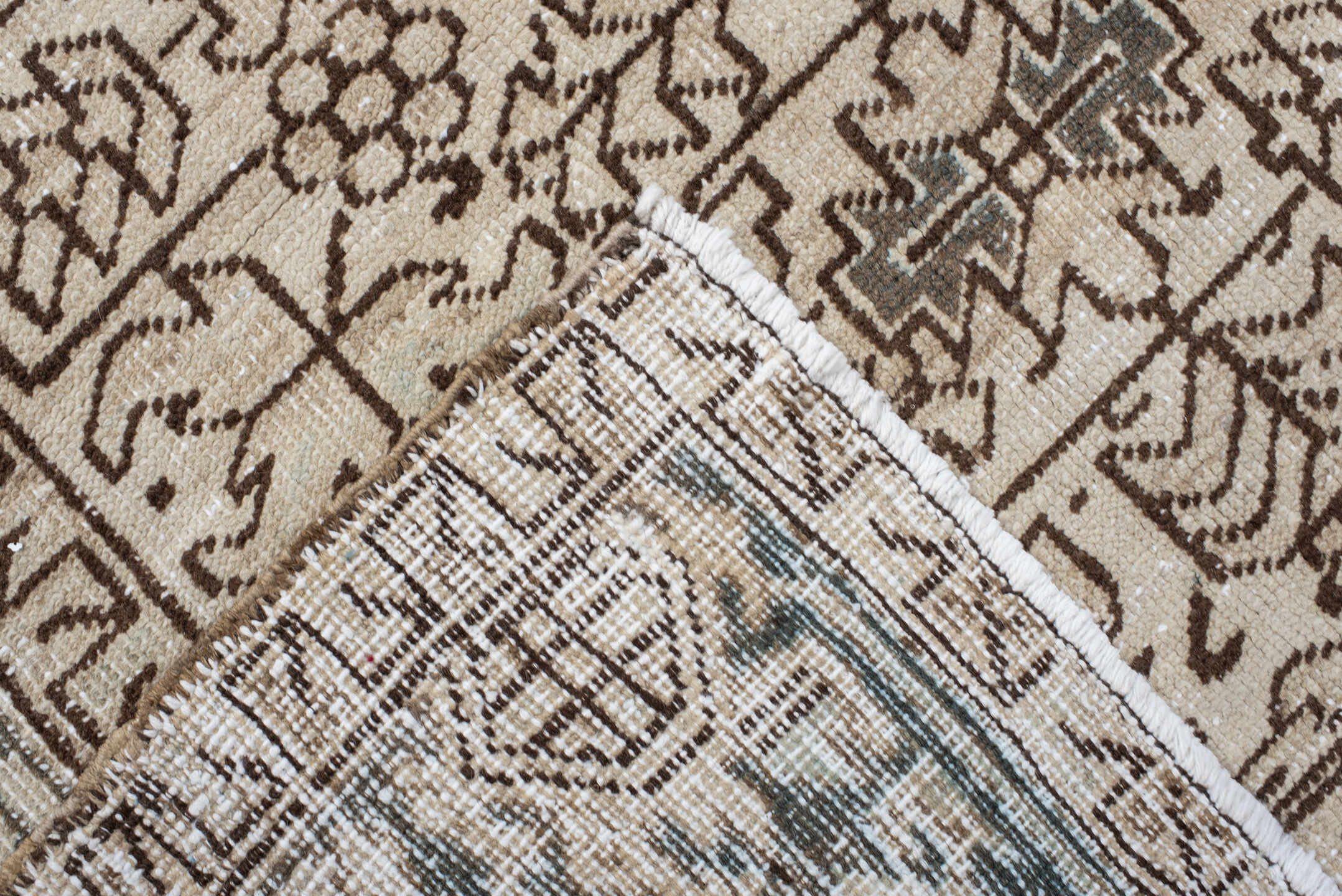 7' x 8' one-of-a-kind handmade antique Heriz rug. Color palette: ivory, taupe, brown, charcoal, beige, gray, black