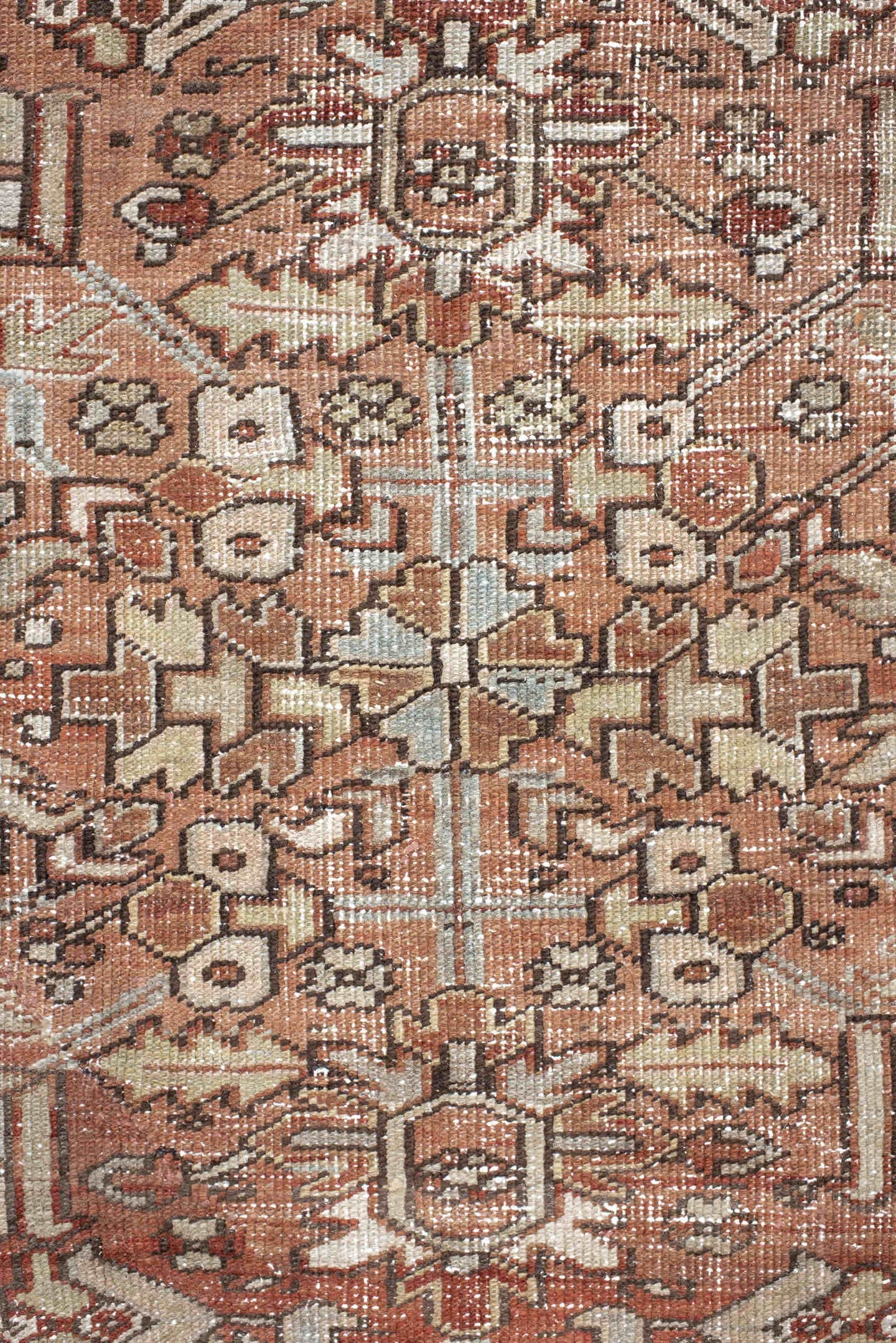 6' x 9' one-of-a-kind handmade antique Heriz medium size rug. Color palette: terra cotta, ivory, taupe, charcoal, slate