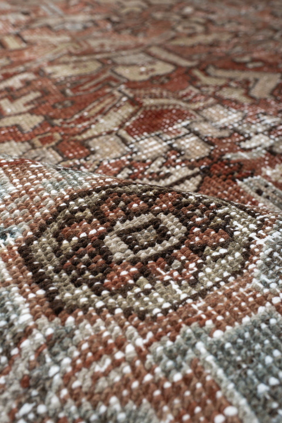 6' x 9' one-of-a-kind handmade antique Heriz medium size rug. Color palette: terra cotta, ivory, taupe, charcoal, slate