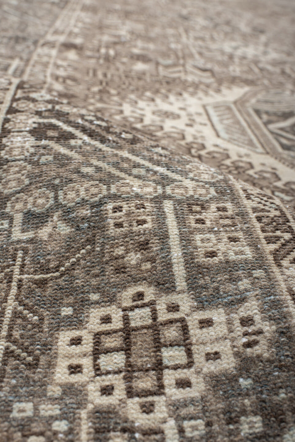 4' x 12' one-of-a-kind handmade antique Karaje runner rug. Color palette: taupe, ivory, brown, slate, charcoal, camel, beige