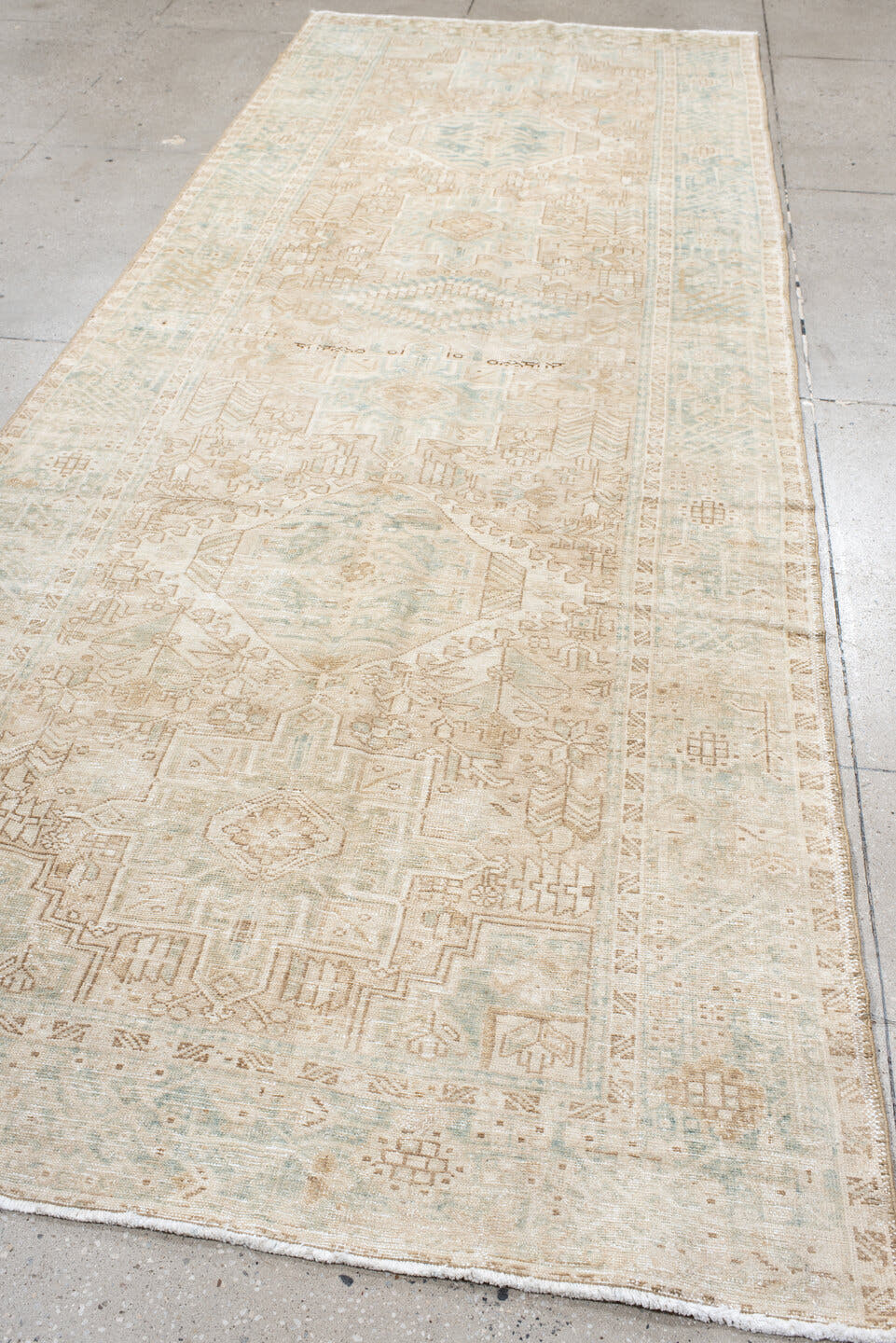 4' x 12' one-of-a-kind handmade antique Karaje runner rug. Color palette: ivory, light blue, beige, sand, taupe, gray