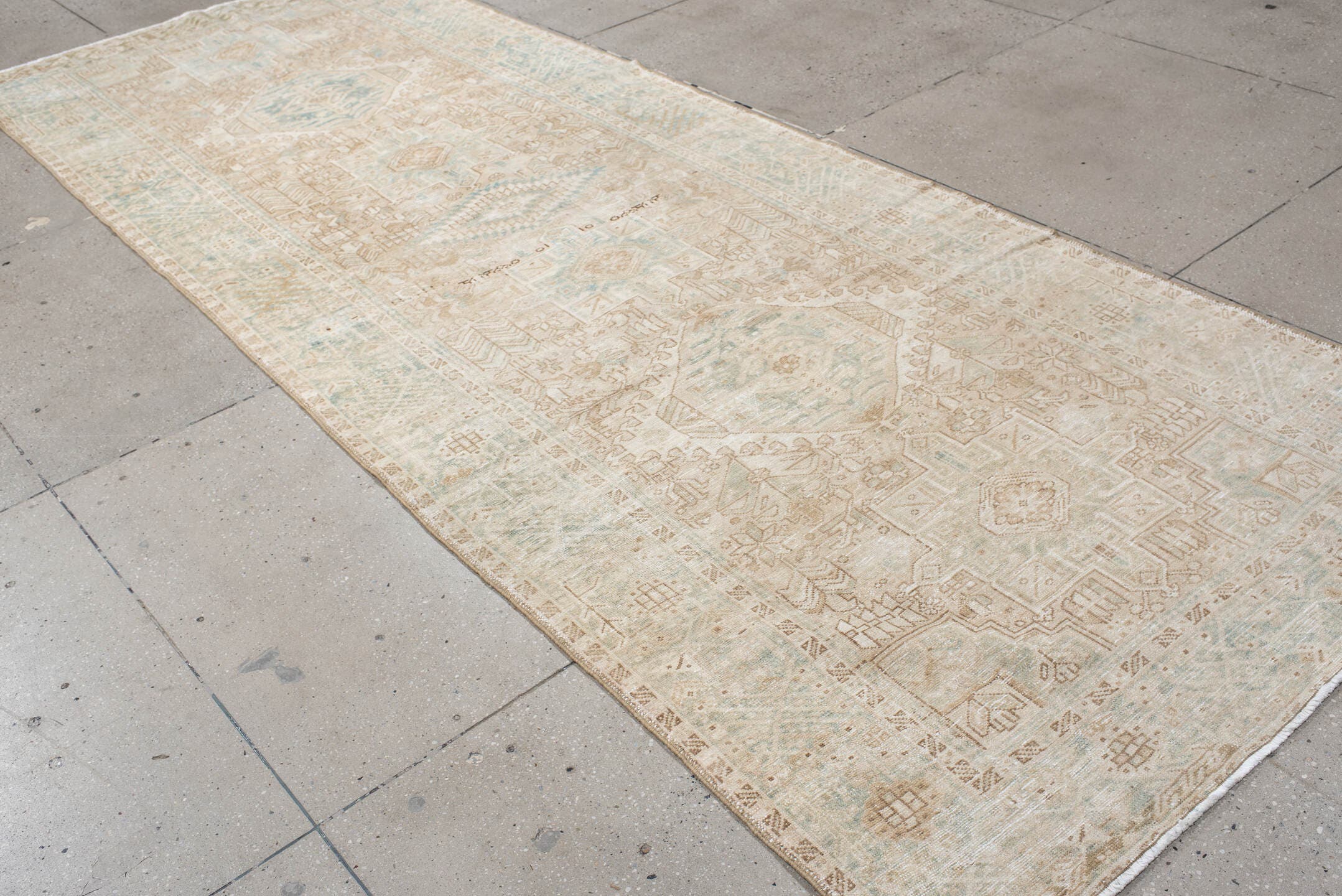4' x 12' one-of-a-kind handmade antique Karaje runner rug. Color palette: ivory, light blue, beige, sand, taupe, gray