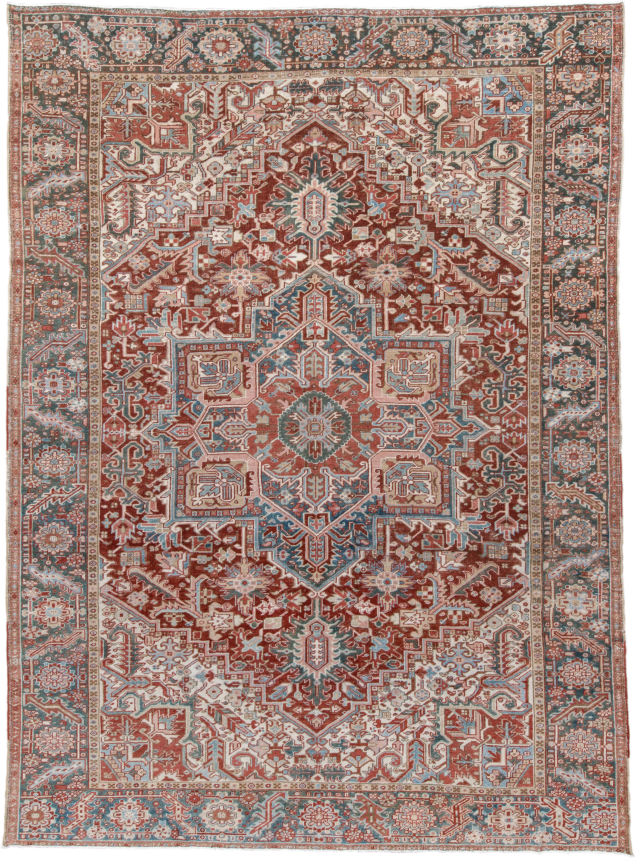 8' x 12' one-of-a-kind handmade antique Heriz large size rug. Color palette: rust, ivory, sky blue, slate, brick, cream