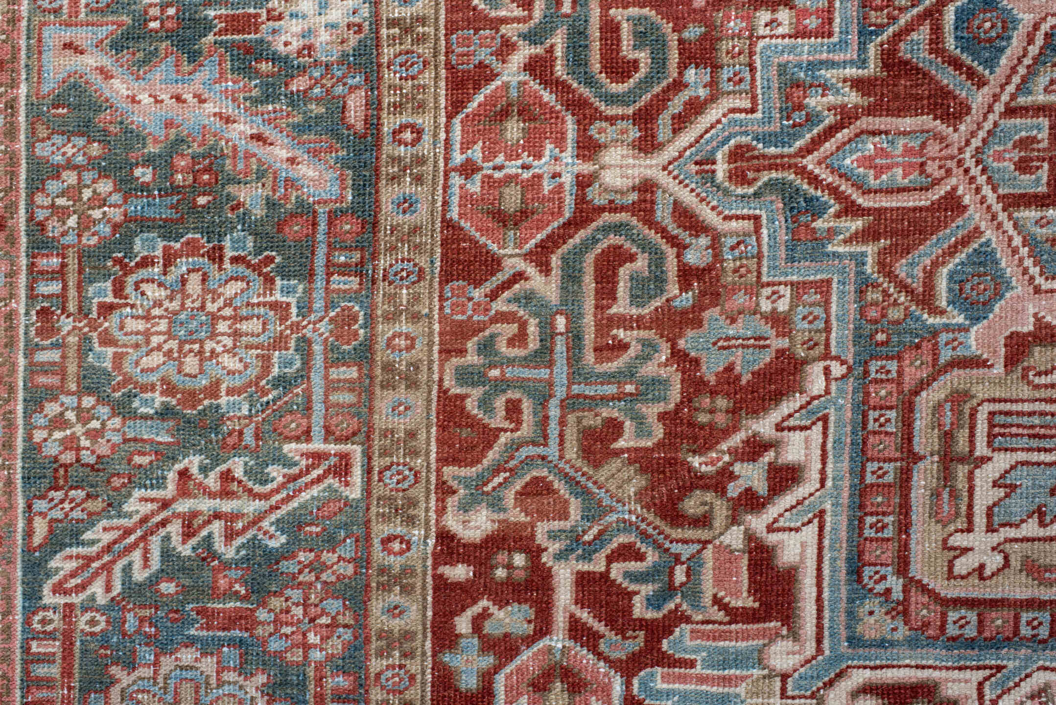 8' x 12' one-of-a-kind handmade antique Heriz large size rug. Color palette: rust, ivory, sky blue, slate, brick, cream