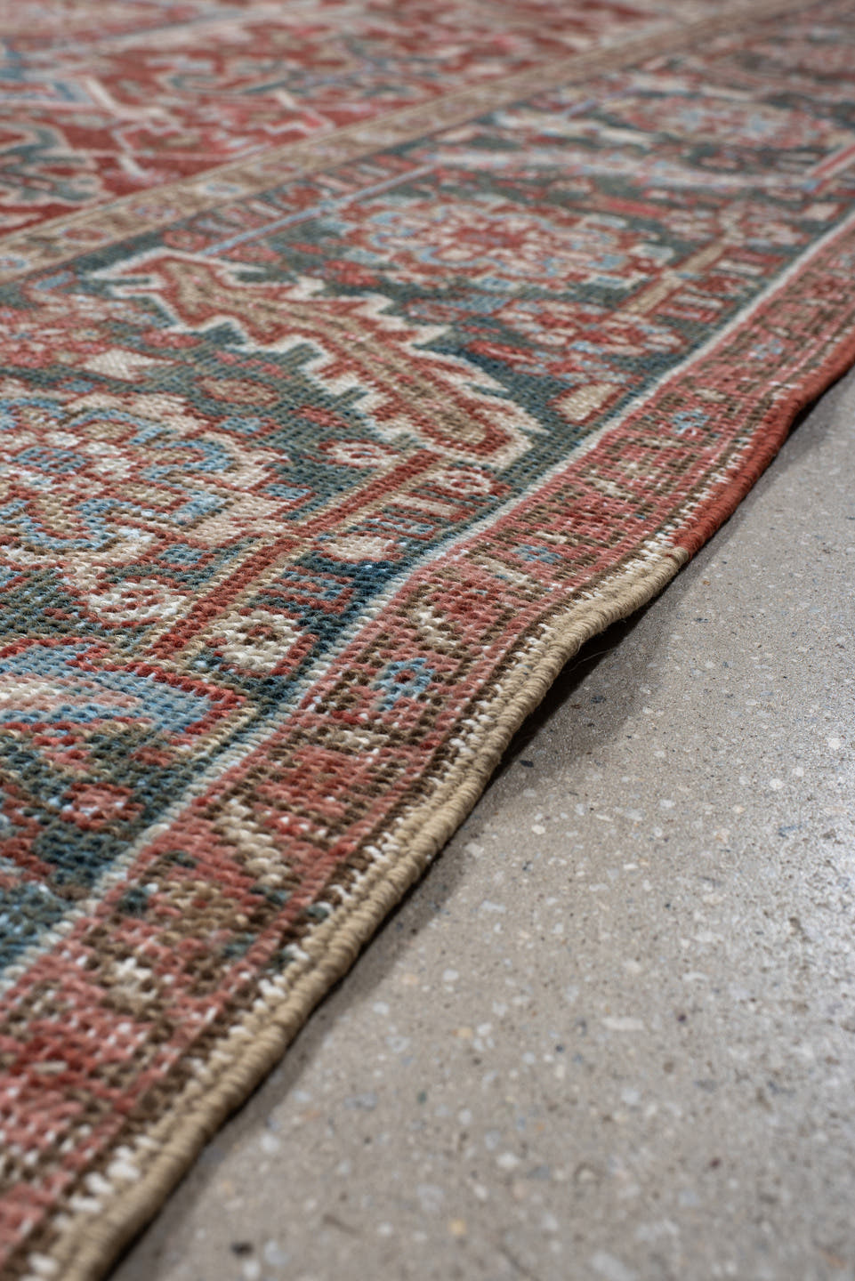 8' x 12' one-of-a-kind handmade antique Heriz large size rug. Color palette: rust, ivory, sky blue, slate, brick, cream