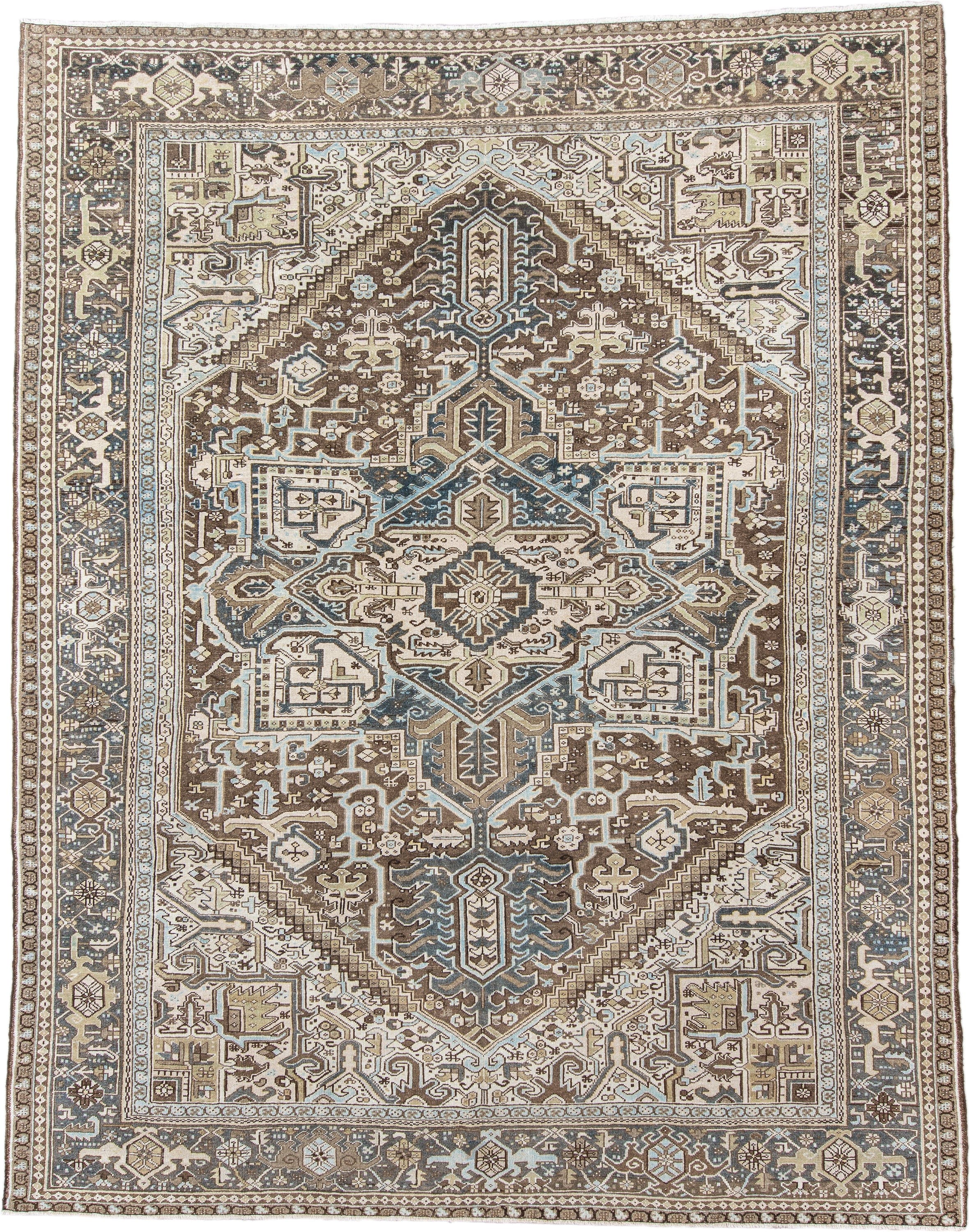 9' x 11' one-of-a-kind handmade antique Karaje large size rug. Color palette: ivory, brown, slate, taupe, camel, charcoal