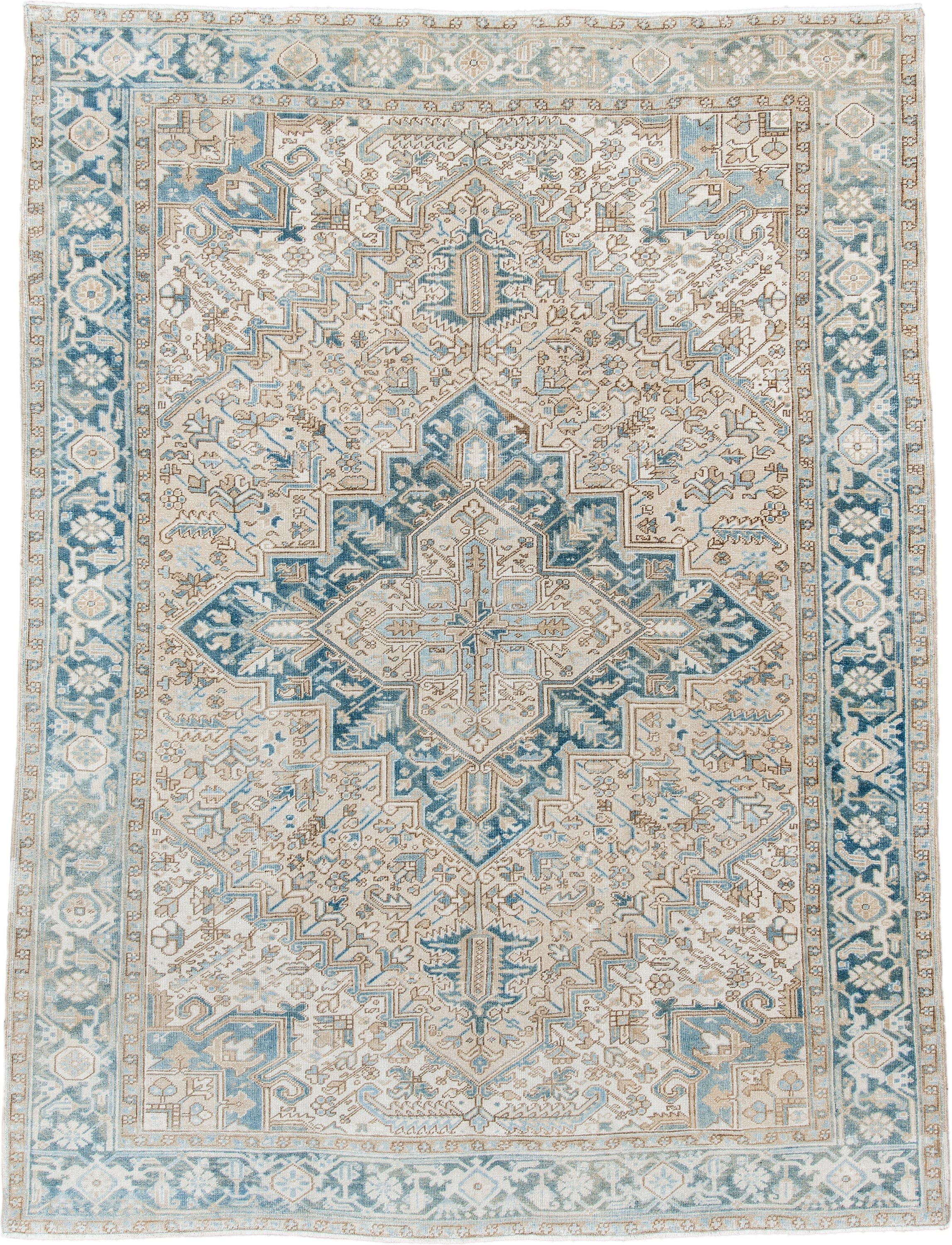 8' x 10' one-of-a-kind handmade antique Heriz large size rug. Color palette: ivory, sky blue, camel, taupe, light blue
