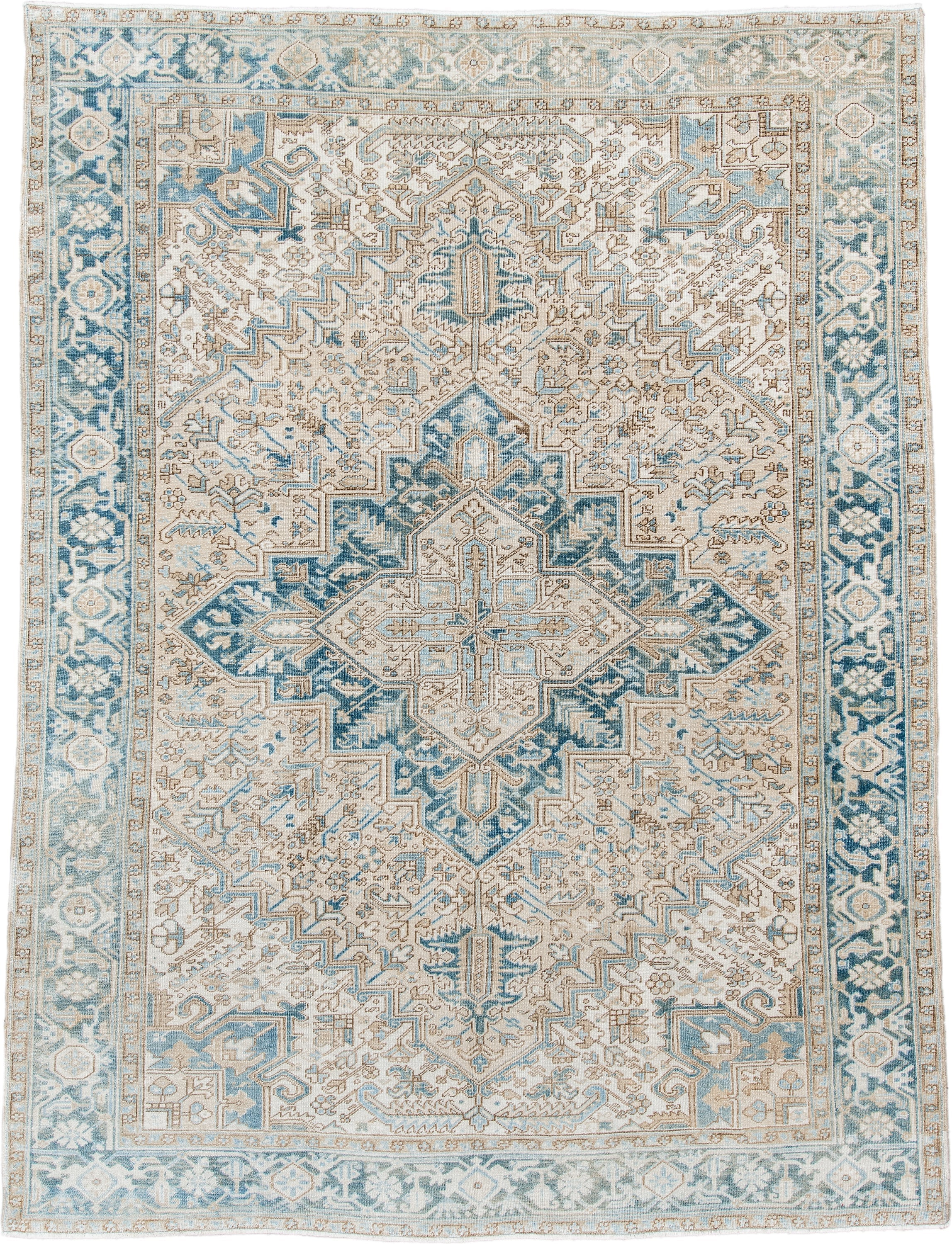 8' x 10' one-of-a-kind handmade antique Heriz large size rug. Color palette: ivory, sky blue, camel, taupe, light blue