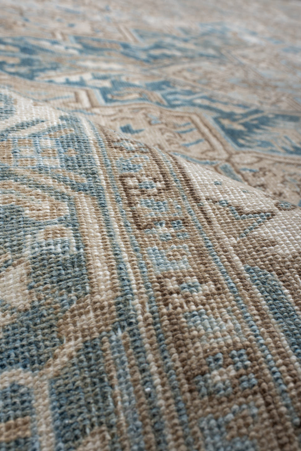 8' x 10' one-of-a-kind handmade antique Heriz large size rug. Color palette: ivory, sky blue, camel, taupe, light blue