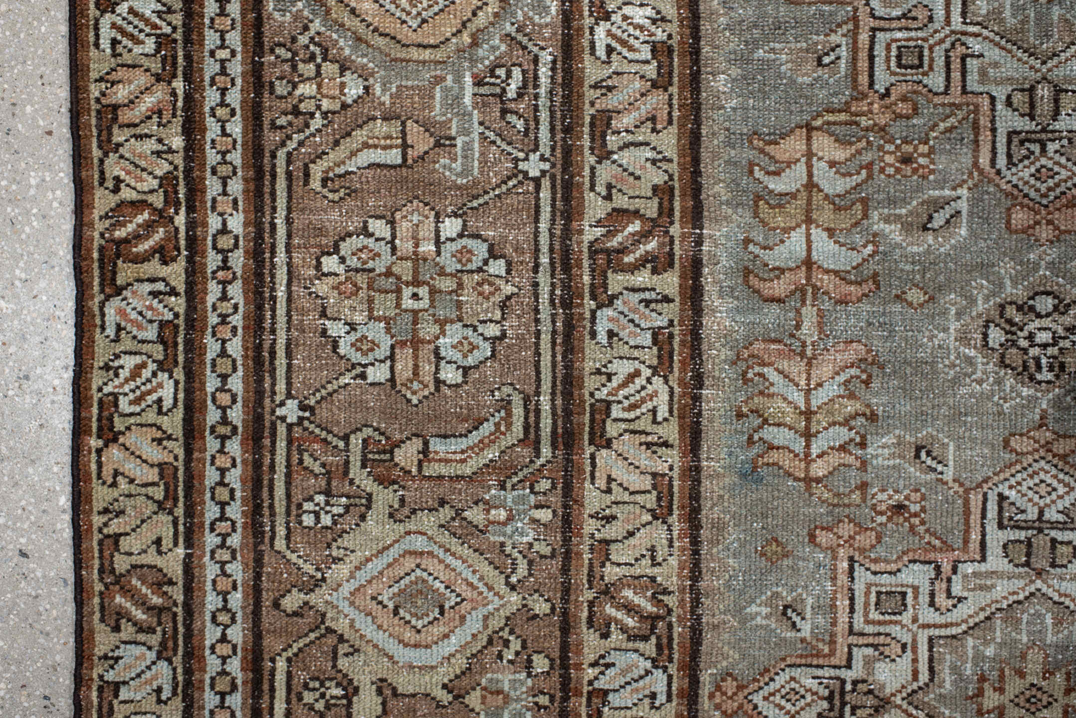 7' x 10' one-of-a-kind handmade vintage Karaje large size rug. Color palette: taupe, brown, ivory, camel, slate, rust, beige
