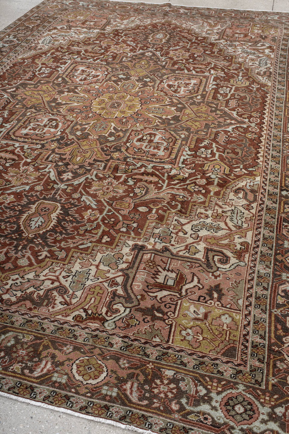8' x 11' one-of-a-kind handmade vintage Heriz large size rug. Color palette: rust, ivory, brown, olive, rose, charcoal