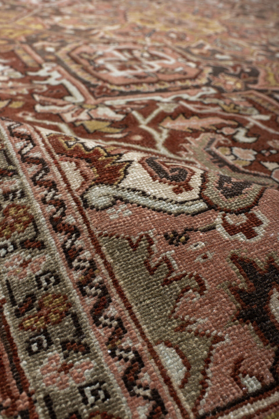 8' x 11' one-of-a-kind handmade vintage Heriz large size rug. Color palette: rust, ivory, brown, olive, rose, charcoal