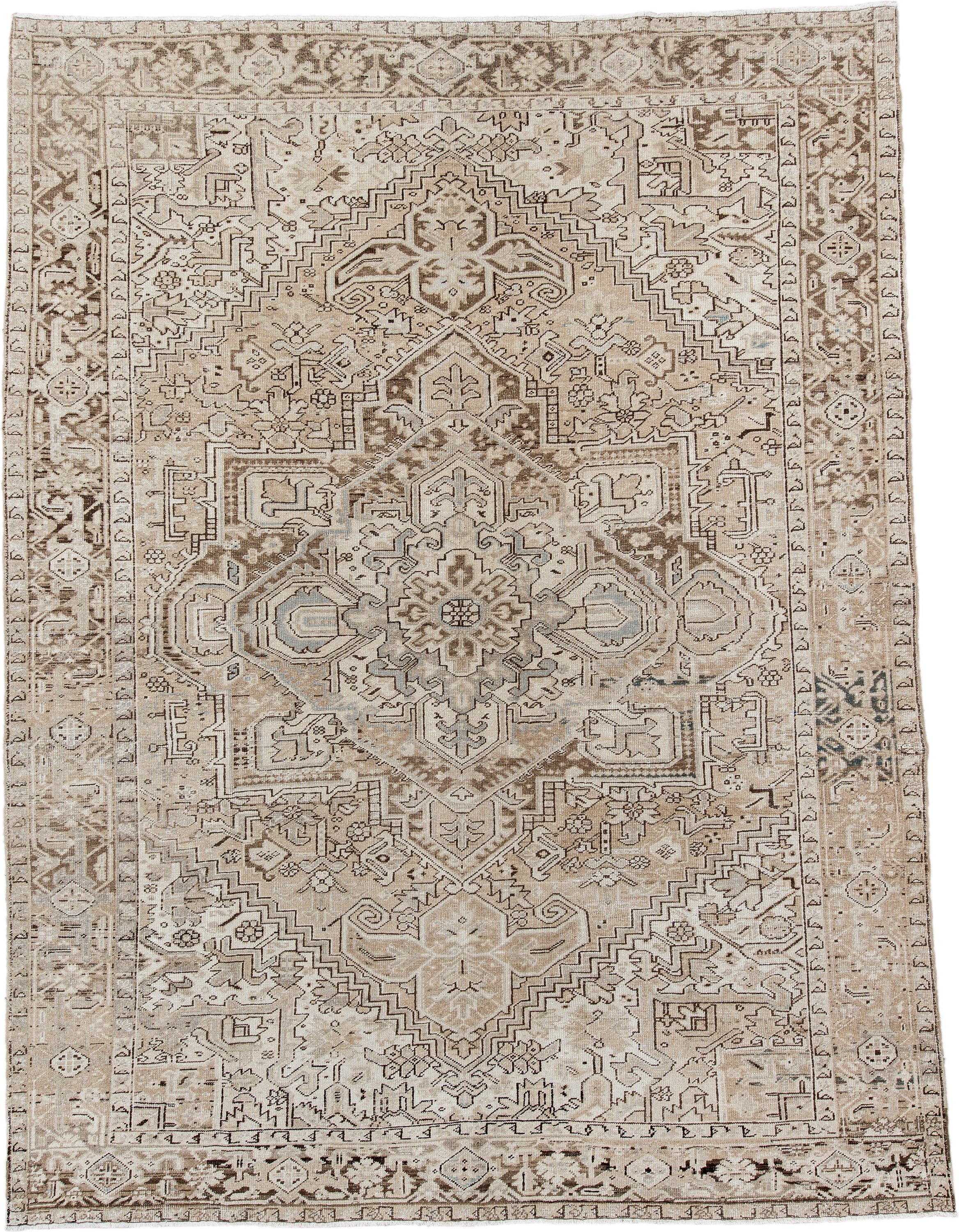 8' x 11' one-of-a-kind handmade antique Heriz large size rug. Color palette: ivory, taupe, beige, brown, camel, slate, gray