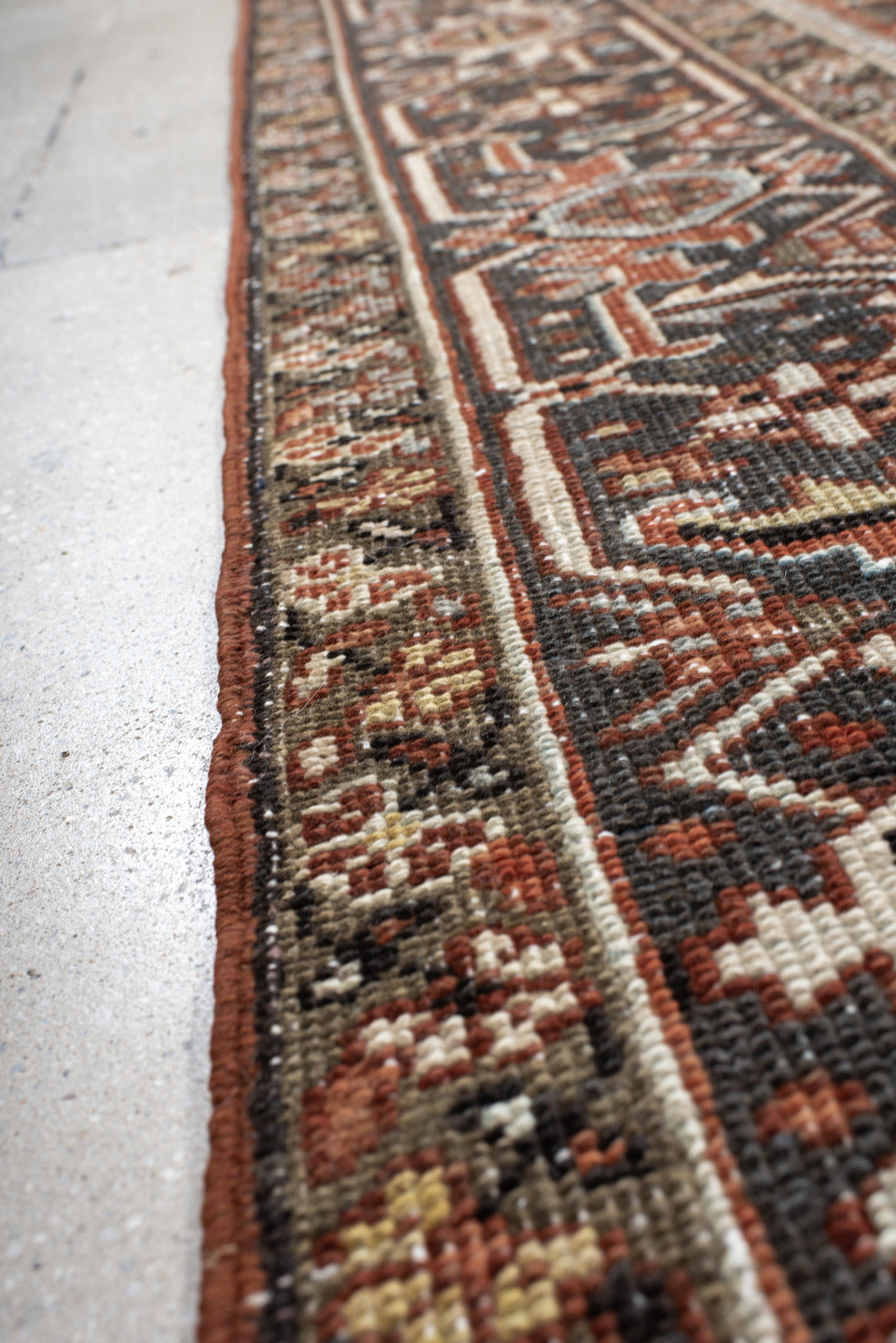 6' x 9' one-of-a-kind handmade vintage Heriz medium size rug. Color palette: black, brown, charcoal, dark gray, dim gray