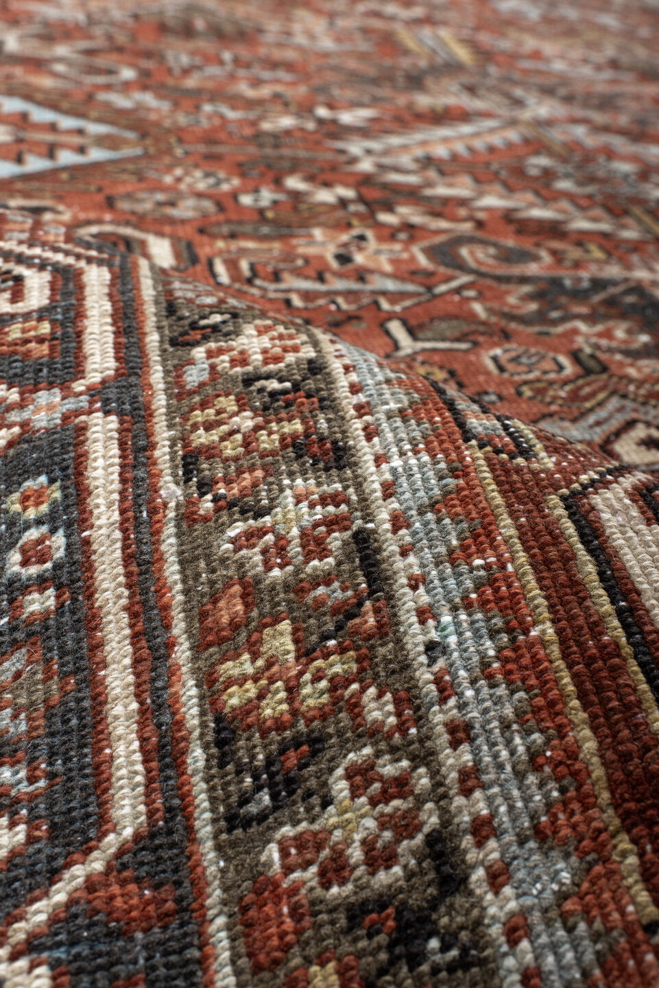 6' x 9' one-of-a-kind handmade vintage Heriz medium size rug. Color palette: black, brown, charcoal, dark gray, dim gray