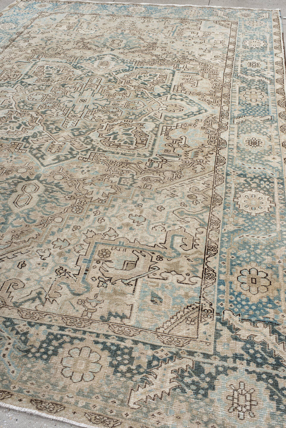 8' x 12' one-of-a-kind handmade antique Heriz large size rug. Color palette: ivory, sky blue, taupe, beige, slate, camel