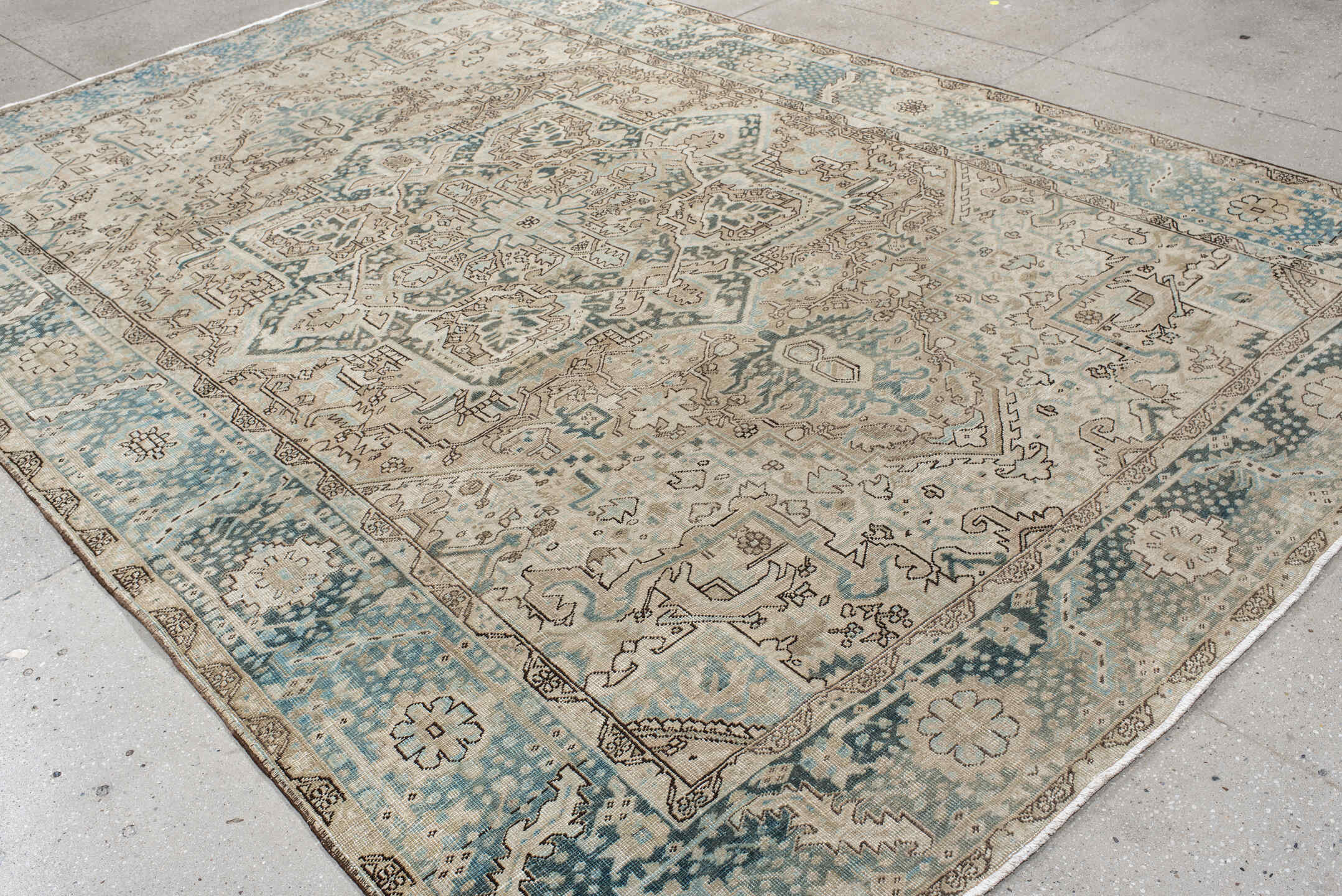 8' x 12' one-of-a-kind handmade antique Heriz large size rug. Color palette: ivory, sky blue, taupe, beige, slate, camel