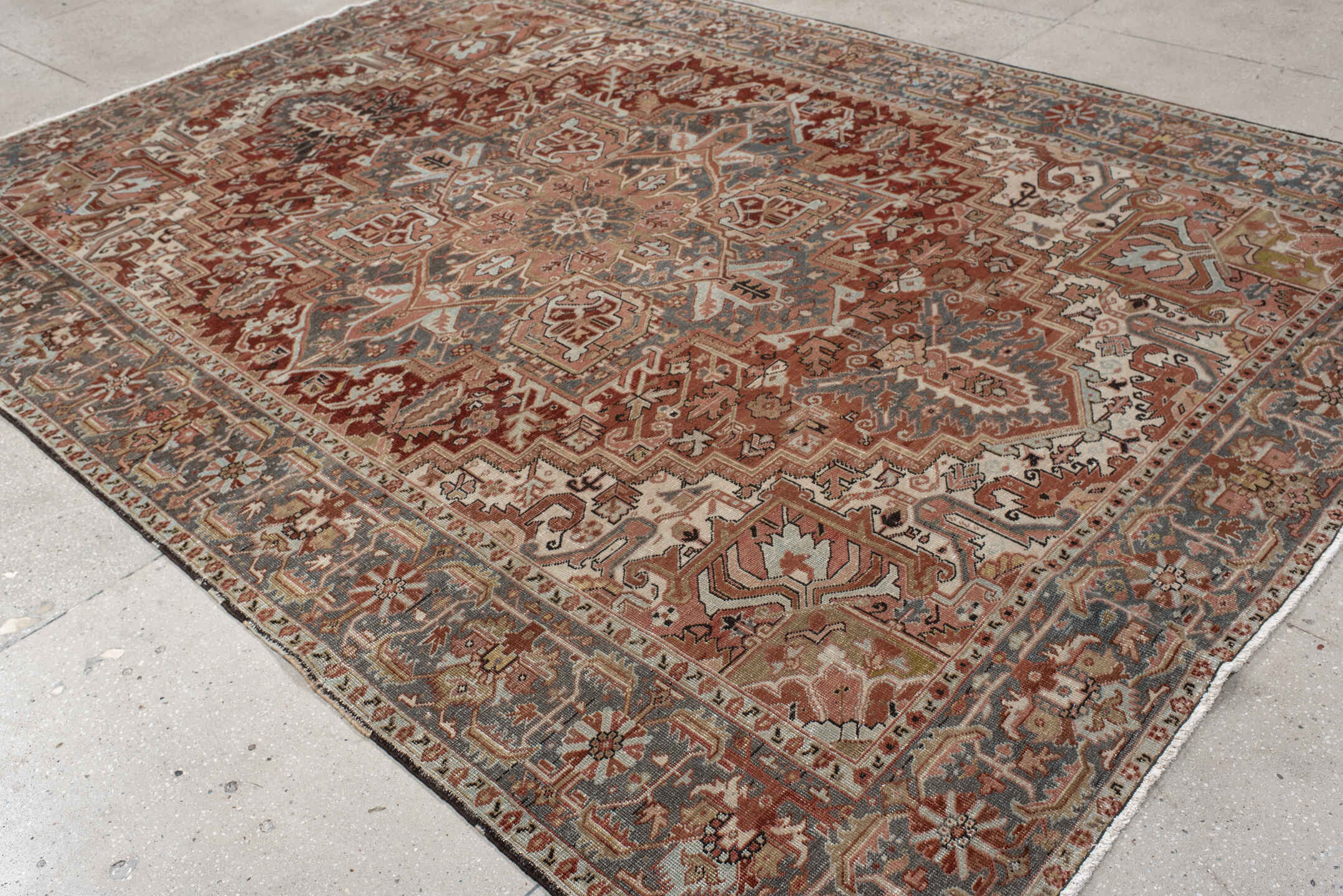 8' x 11' one-of-a-kind handmade vintage Heriz large size rug. Color palette: ivory, rust, steel blue, blush, taupe, brown