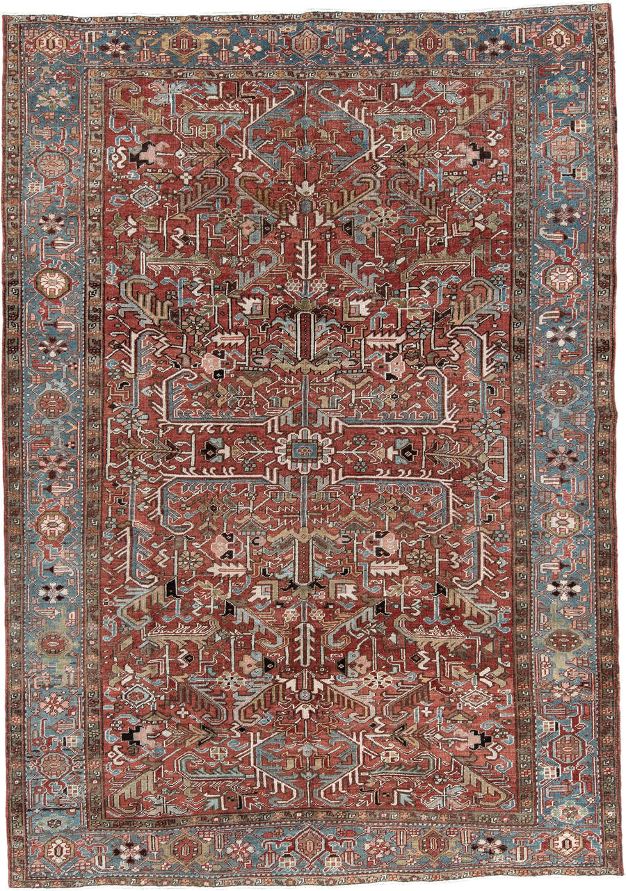 7' x 11' one-of-a-kind handmade antique Heriz large size rug. Color palette: rust, sky blue, ivory, taupe, charcoal, camel