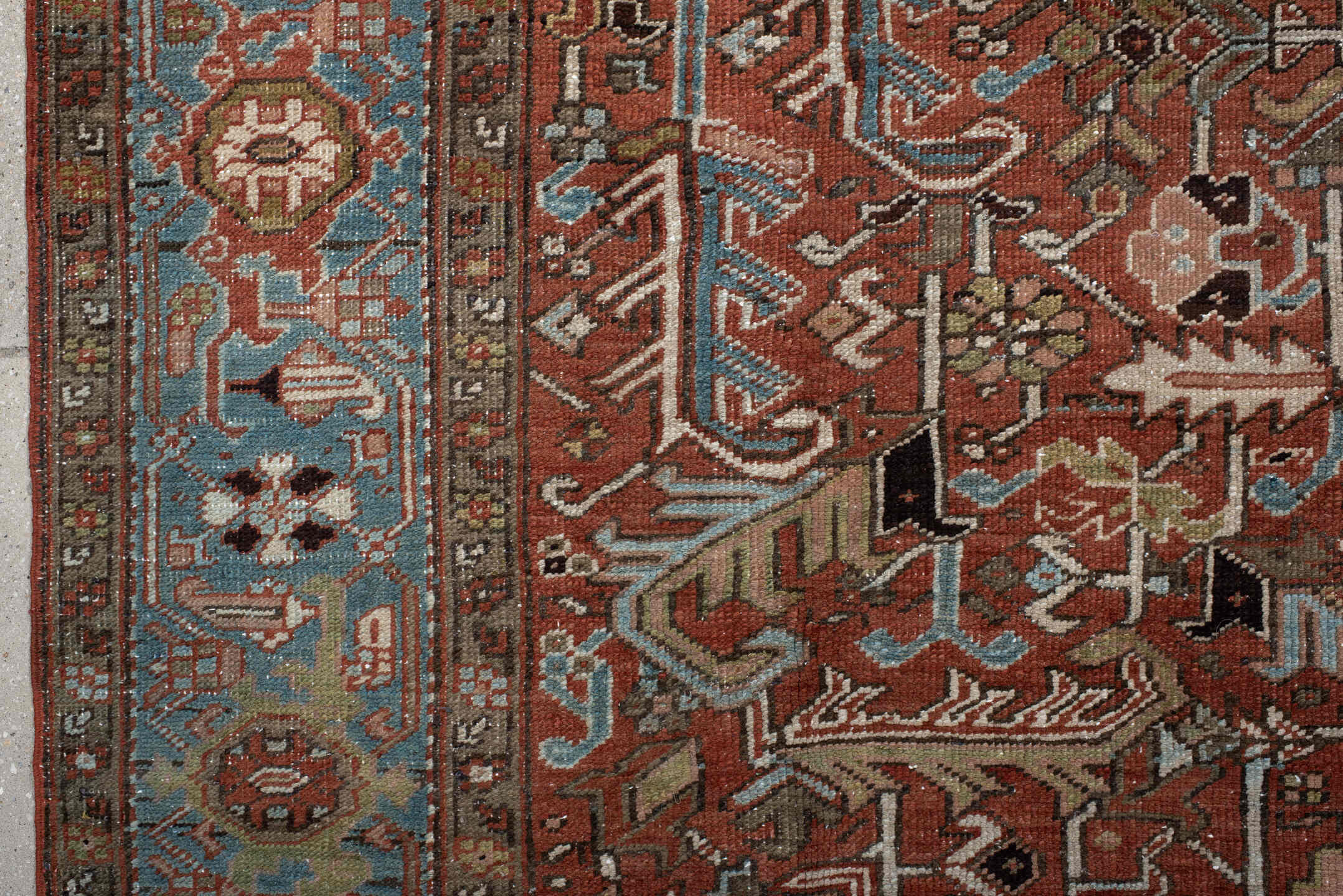 7' x 11' one-of-a-kind handmade antique Heriz large size rug. Color palette: rust, sky blue, ivory, taupe, charcoal, camel