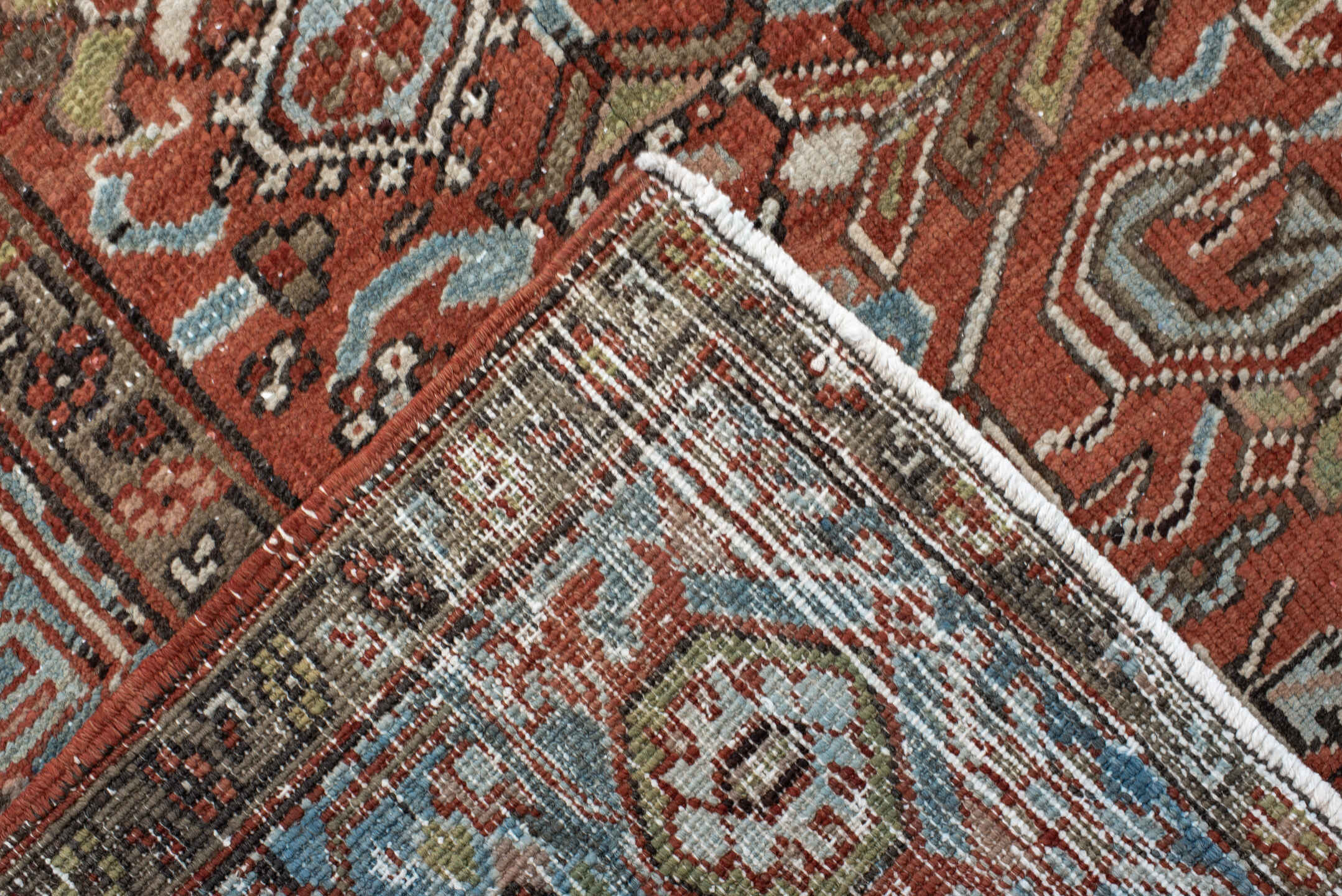 7' x 11' one-of-a-kind handmade antique Heriz large size rug. Color palette: rust, sky blue, ivory, taupe, charcoal, camel