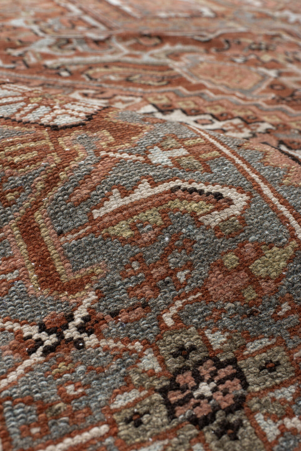 9' x 11' one-of-a-kind handmade vintage Heriz large size rug. Color palette: rust, blue-gray, ivory, coral, taupe, charcoal