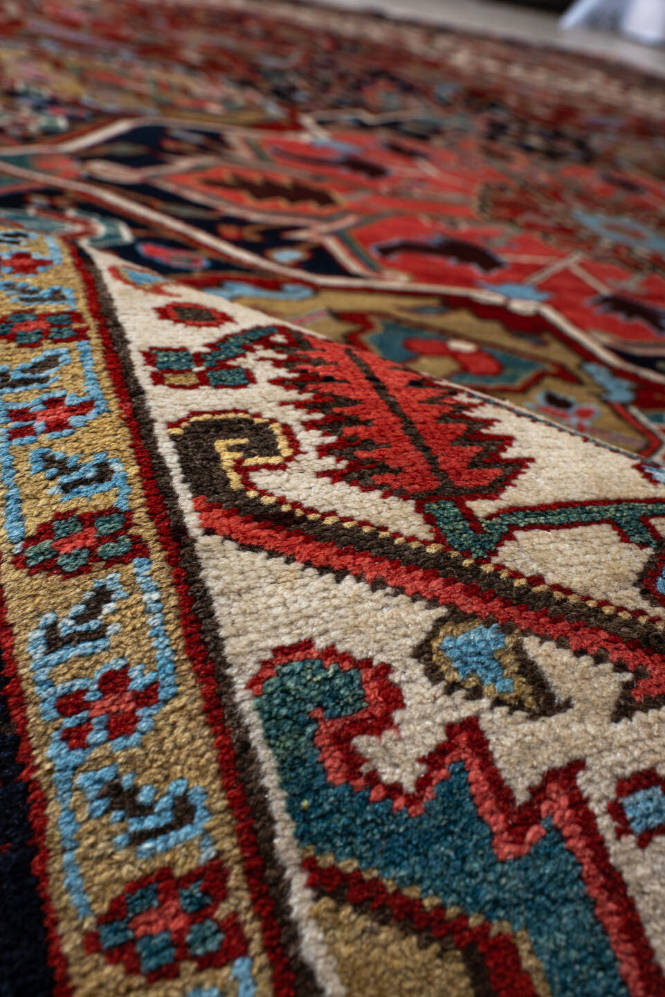 8' x 12' one-of-a-kind handmade vintage Heriz large size rug. Color palette: rust, ivory, navy, sky_blue, coral, sage, camel